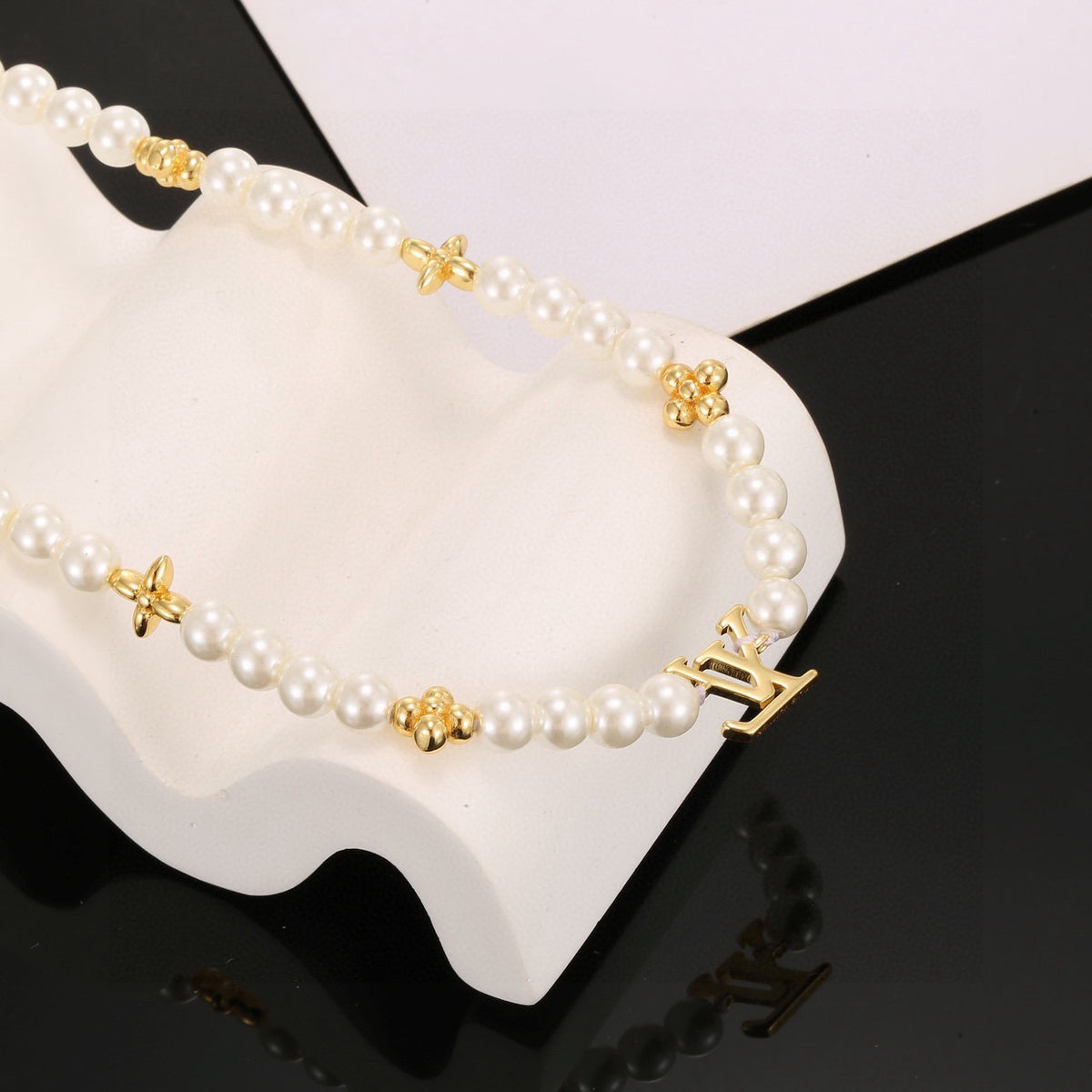 Lock Pendant Necklace in Polished Metal-Tone – Pearl Detail close-up detail