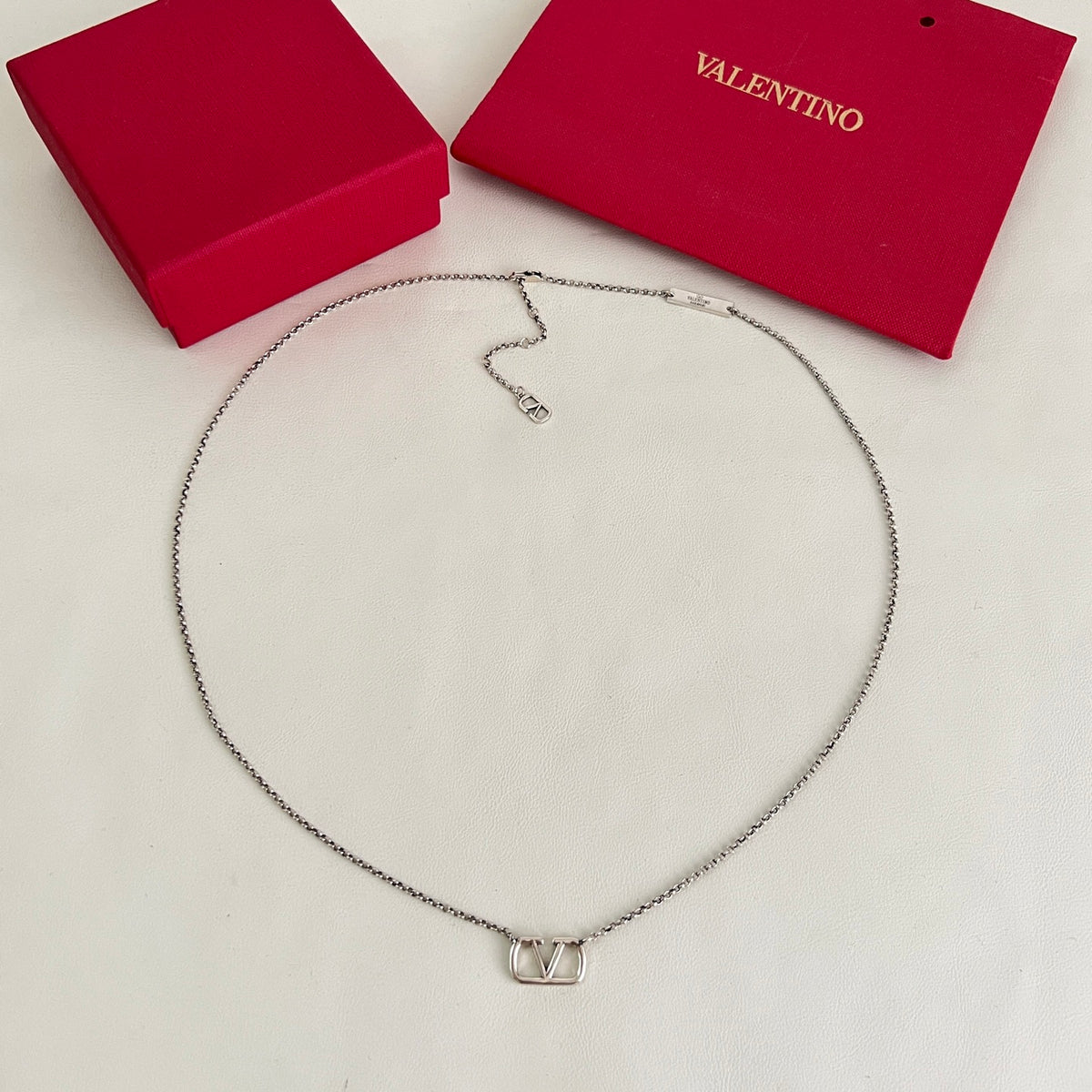 Signature Emblem Pendant Necklace in Polished Metal-Tone – Design 07 close-up view