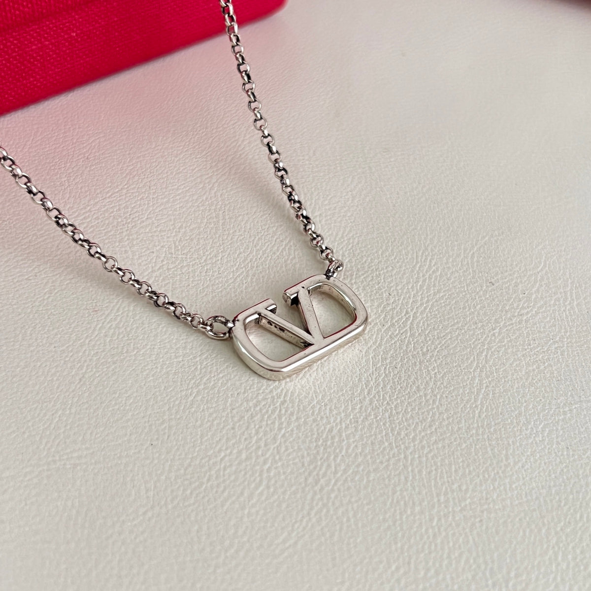 Signature Emblem Pendant Necklace in Polished Metal-Tone – Design 07 front view
