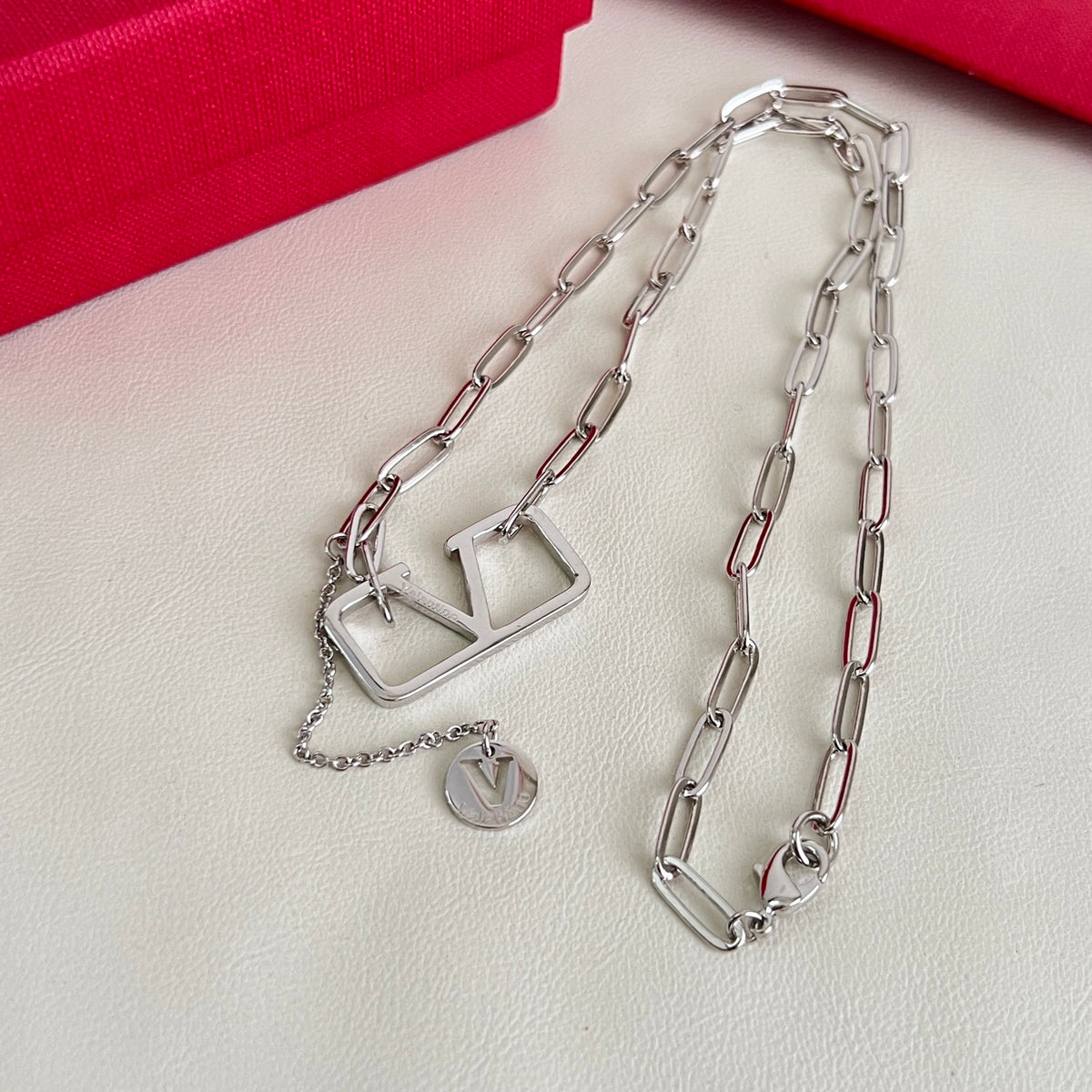 Signature Emblem Pendant Necklace in Polished Metal-Tone – Design 06 styled detail