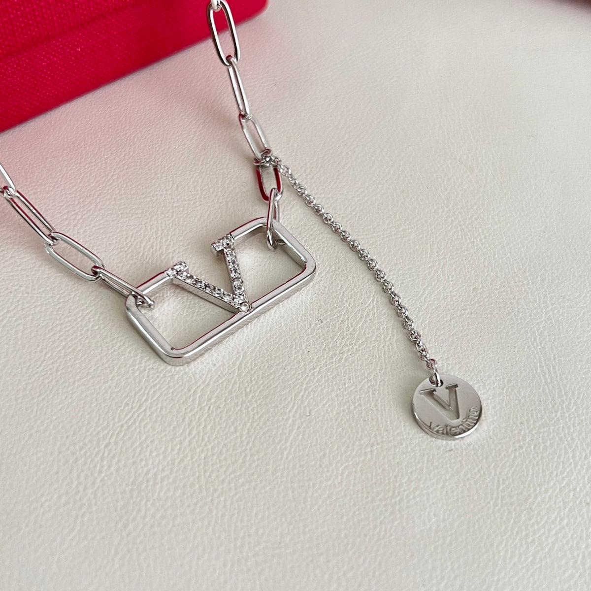Signature Emblem Pendant Necklace in Polished Metal-Tone – Design 06 close-up view
