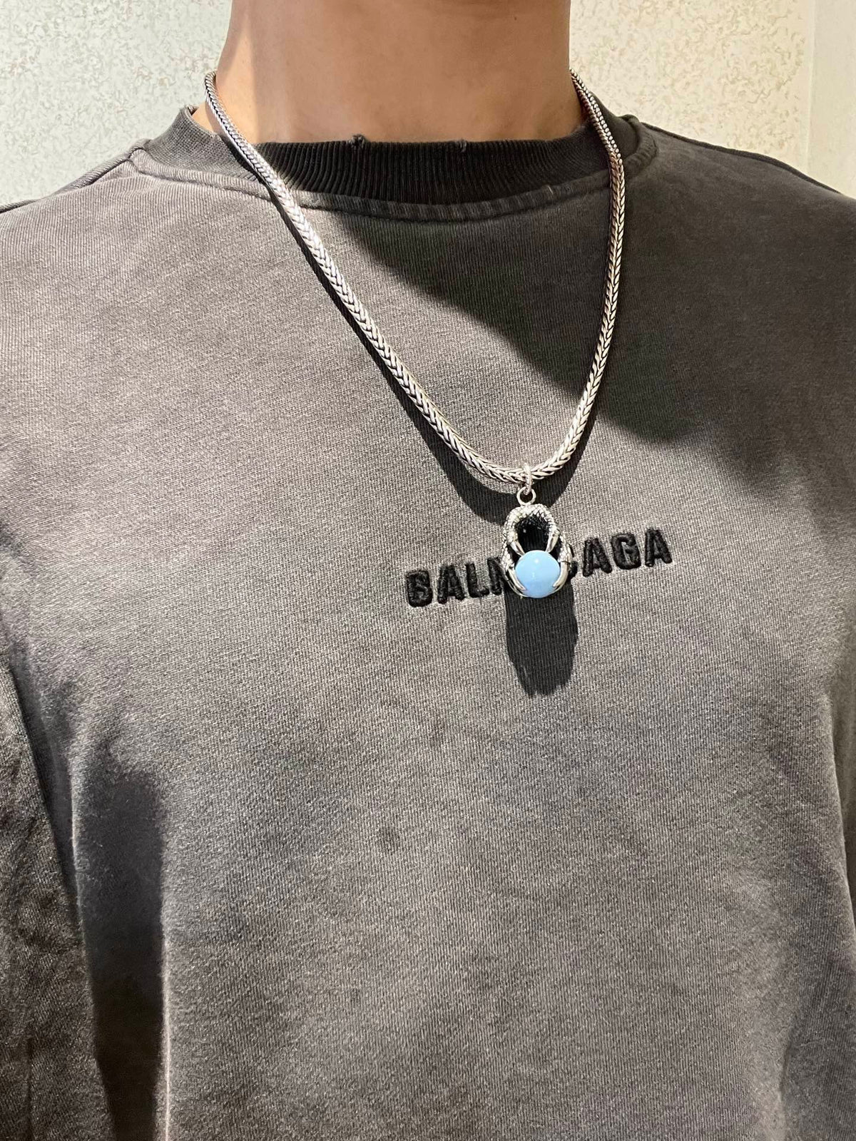 Double-G Emblem Pendant Necklace in Polished Metal-Tone – Turquoise Detail detail view