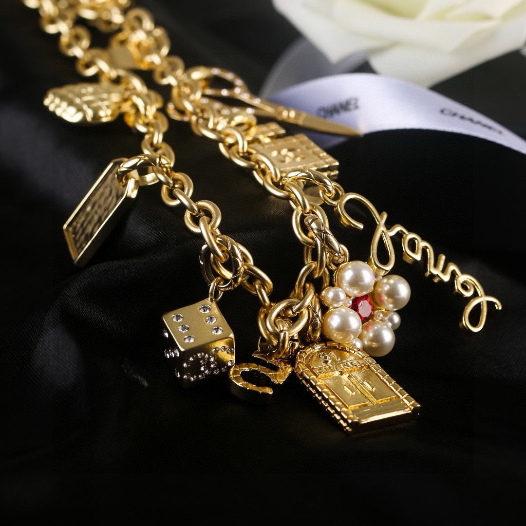Signature Emblem Jewelry Accessory in Polished Metal-Tone – White Detail – Design 005 close-up detail