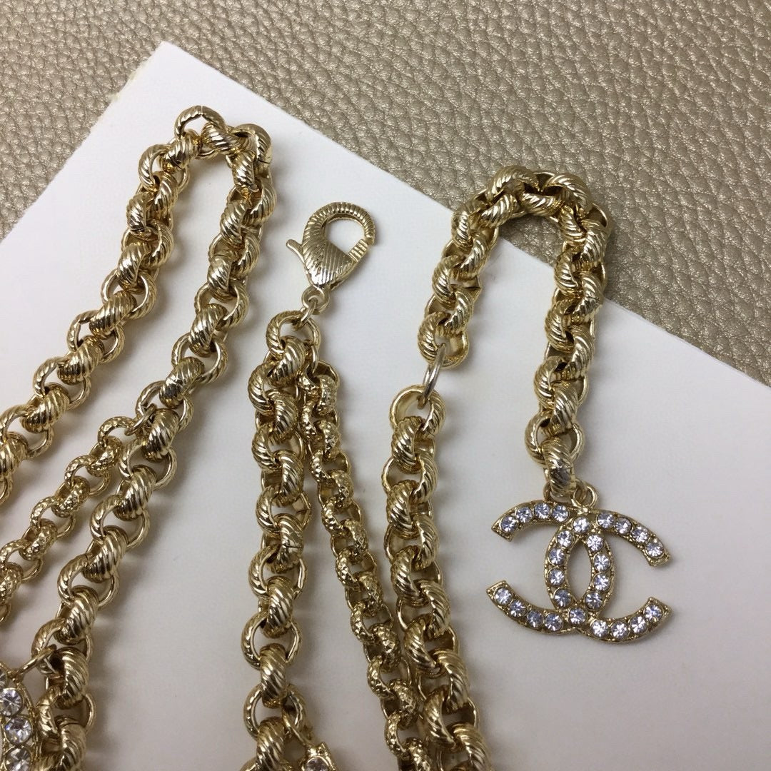 Signature Emblem Jewelry Accessory in Gold-Tone – White Detail – Design 004 styled product view
