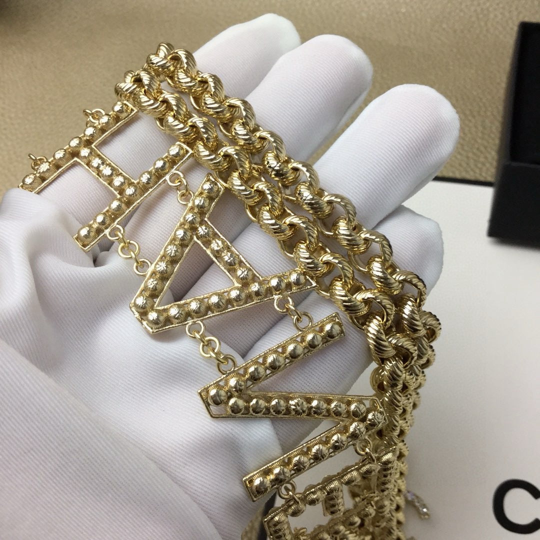 Signature Emblem Jewelry Accessory in Gold-Tone – White Detail – Design 003 styled product view