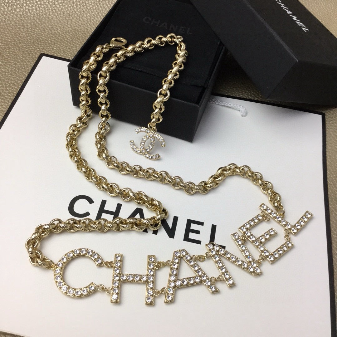 Signature Emblem Jewelry Accessory in Gold-Tone – White Detail – Design 003 main product view