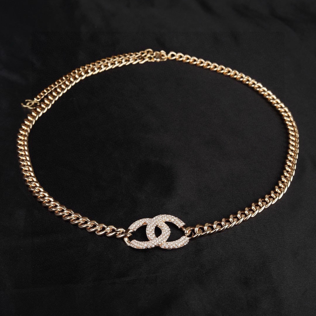 Signature Emblem Jewelry Accessory in Polished Metal-Tone – White Detail – Design 004 close-up detail