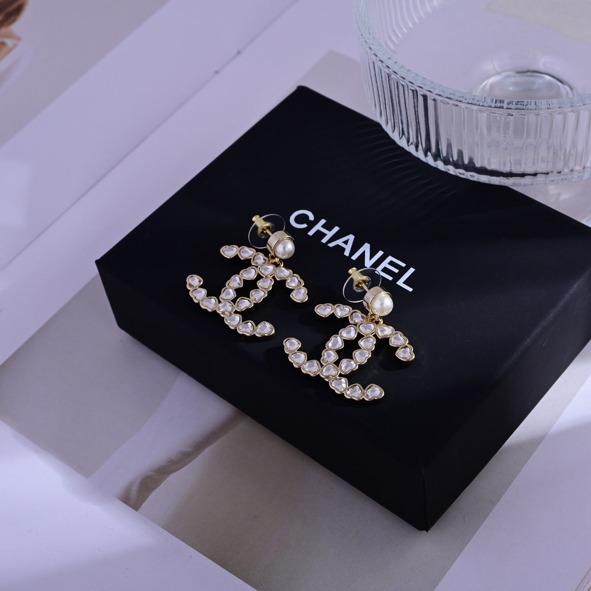 Signature Emblem Stud Earrings in Polished Metal-Tone – Design 065 detail view