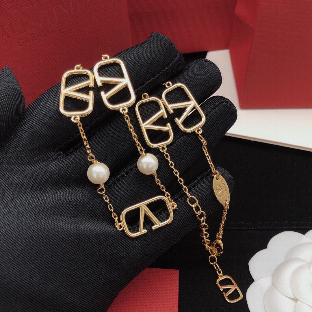 Signature Emblem Pendant Necklace in Polished Metal-Tone – Design 11 close-up view