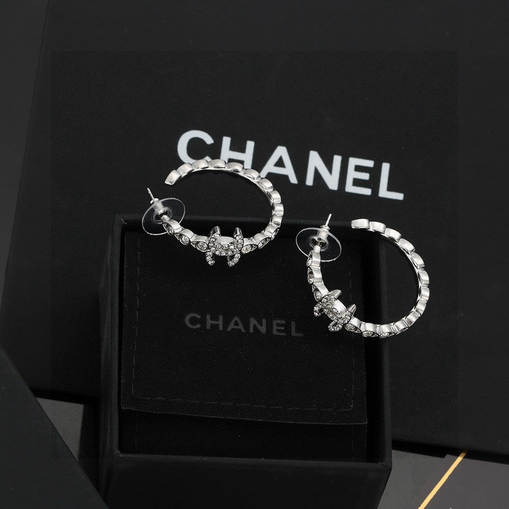 Signature Emblem Crystal-Accent Stud Earrings – Red Detail – Design 004 close-up detail