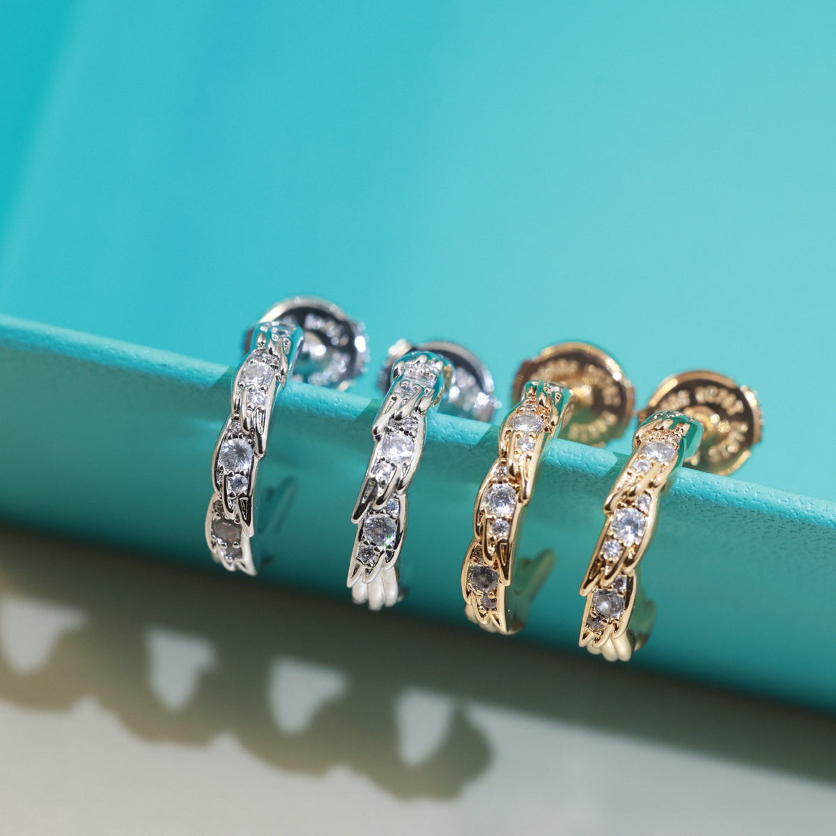 Signature Motif Stud Earrings in Polished Metal-Tone – Design 02 side detail