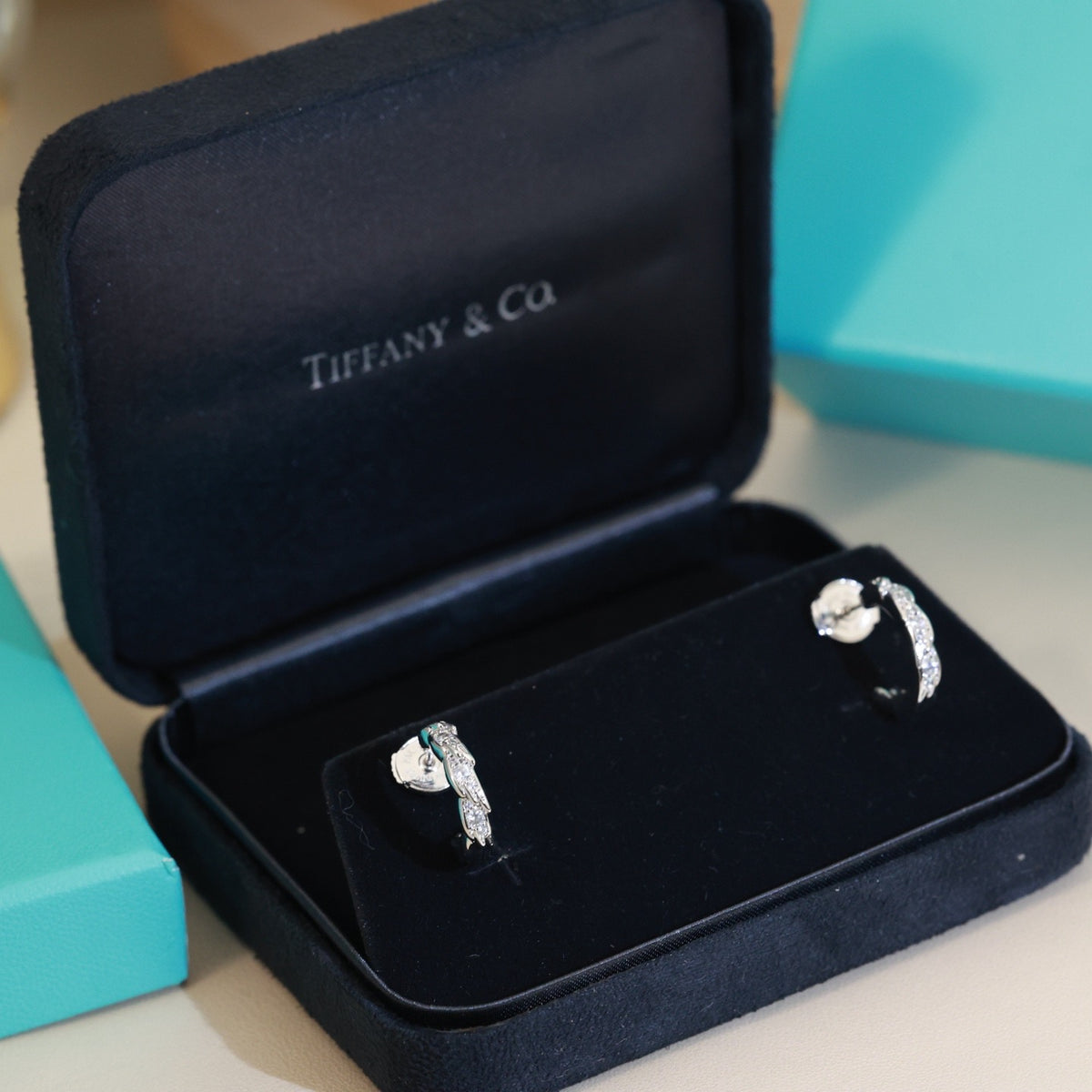 Signature Motif Stud Earrings in Polished Metal-Tone – Design 02 close-up detail