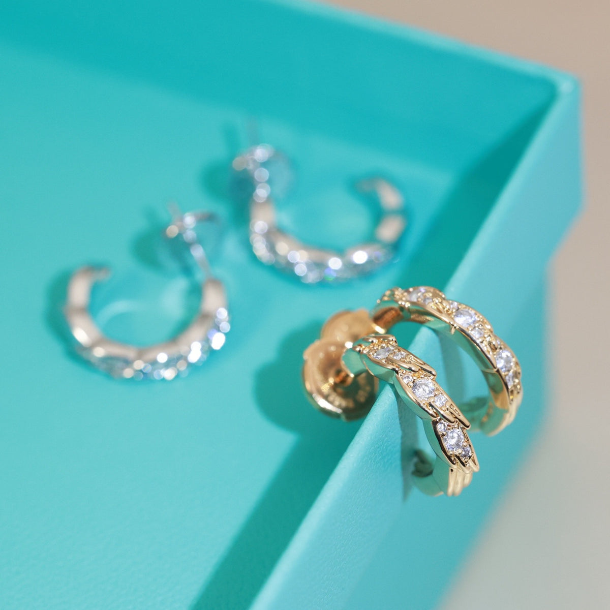 Signature Motif Stud Earrings in Polished Metal-Tone – Design 02 styled product view