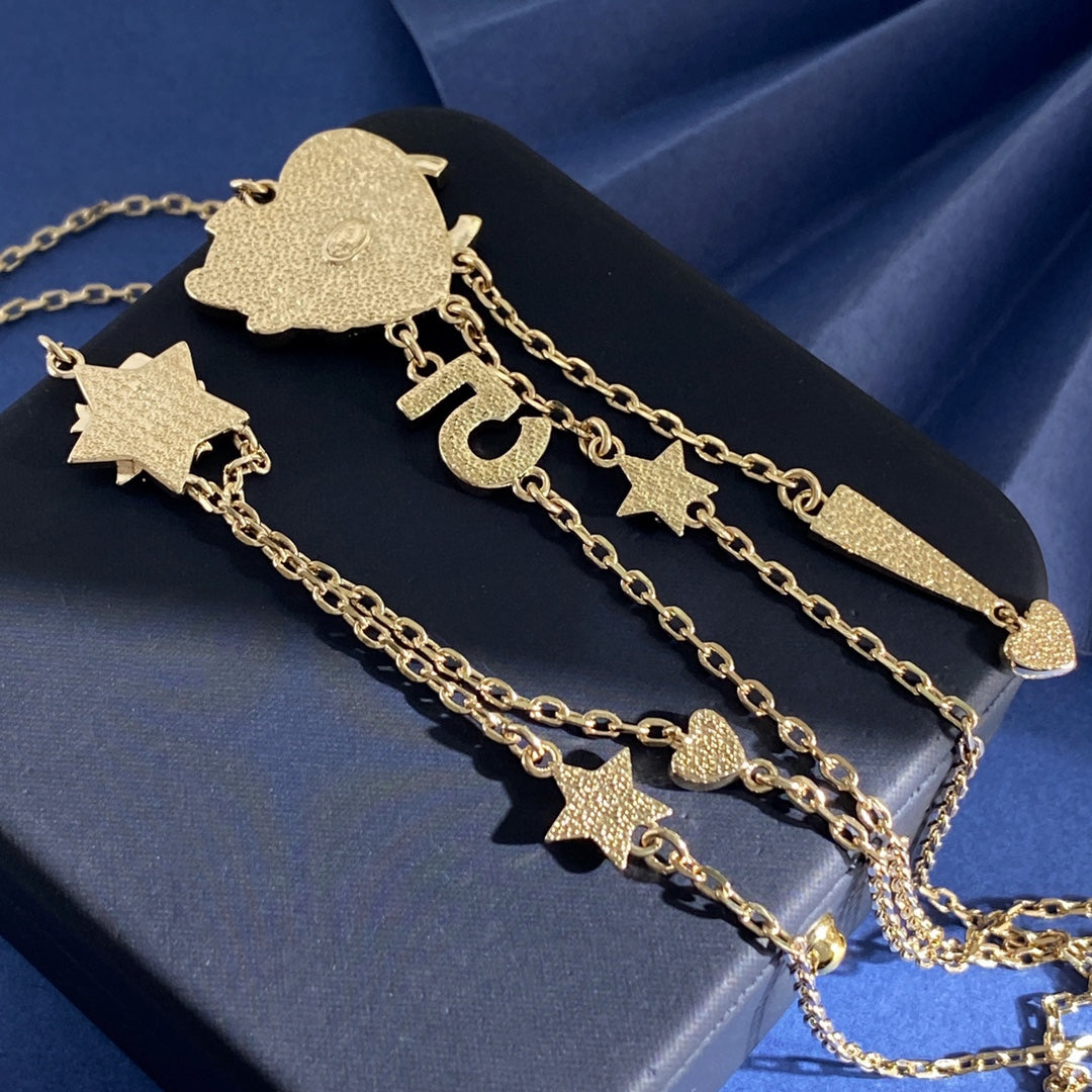 Double-C Emblem Crystal-Accent Pendant Necklace – Heart Detail – Design 009 close-up detail