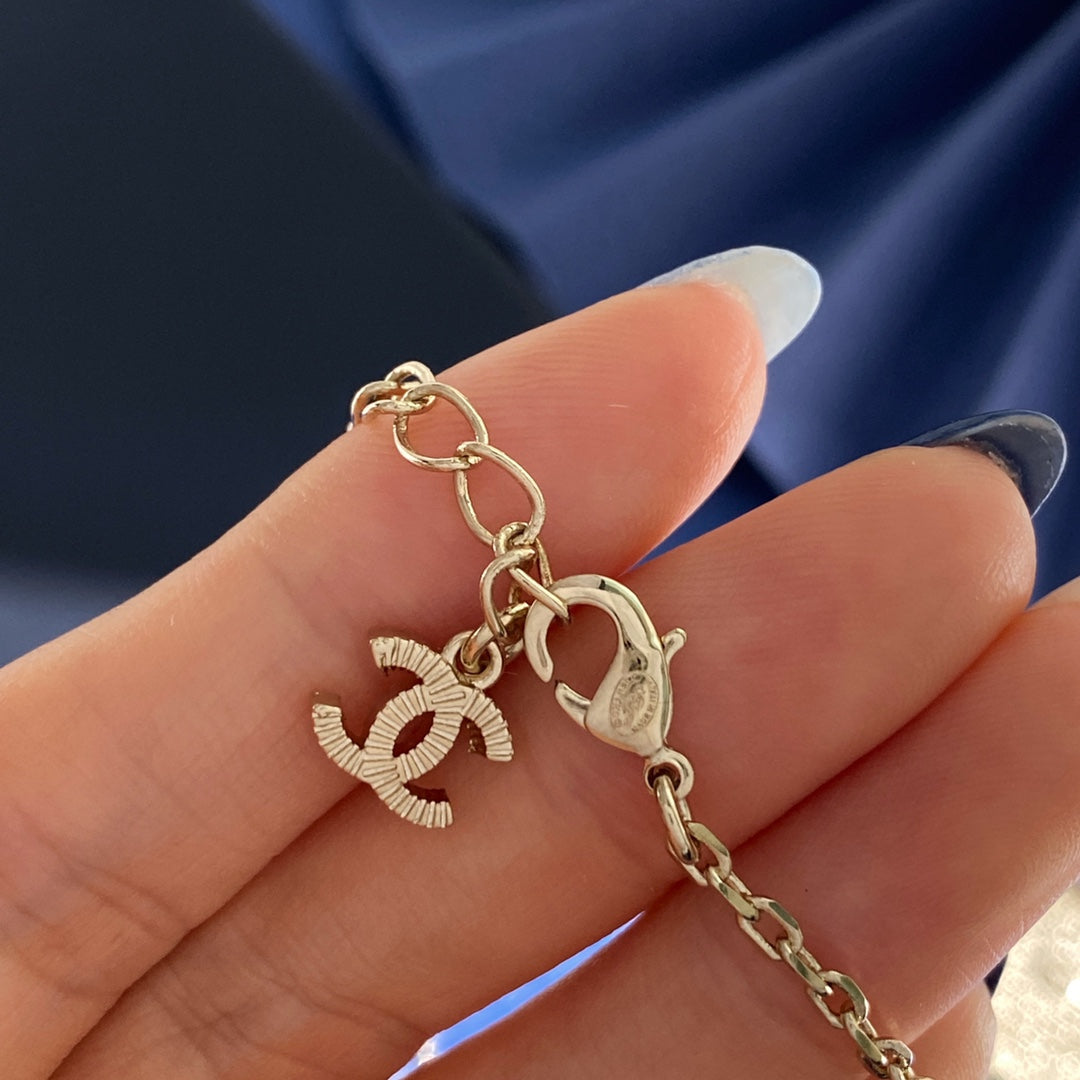 Double-C Emblem Crystal-Accent Pendant Necklace – Heart Detail – Design 009 styled product view
