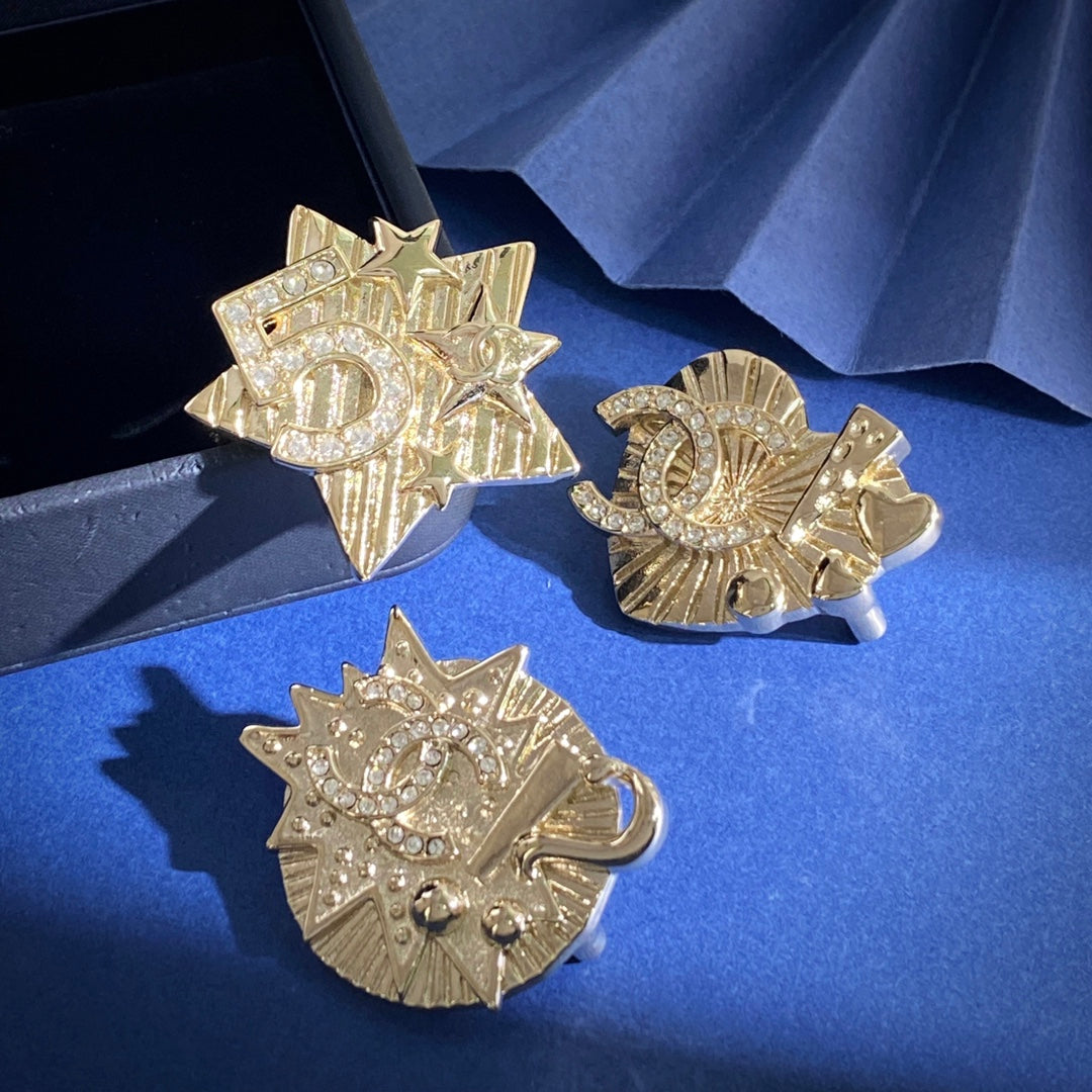 Double-C Emblem Brooch in Gold-Tone – Star Detail – Design 002 styled product view