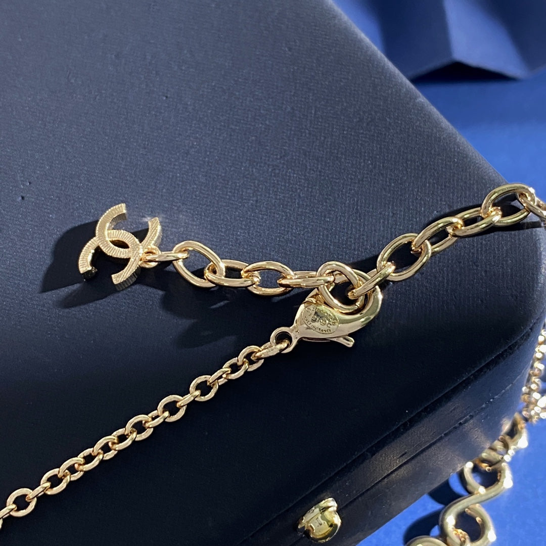 Double-C Emblem Pendant Necklace in Gold-Tone – Heart Detail – Design 002 detail view