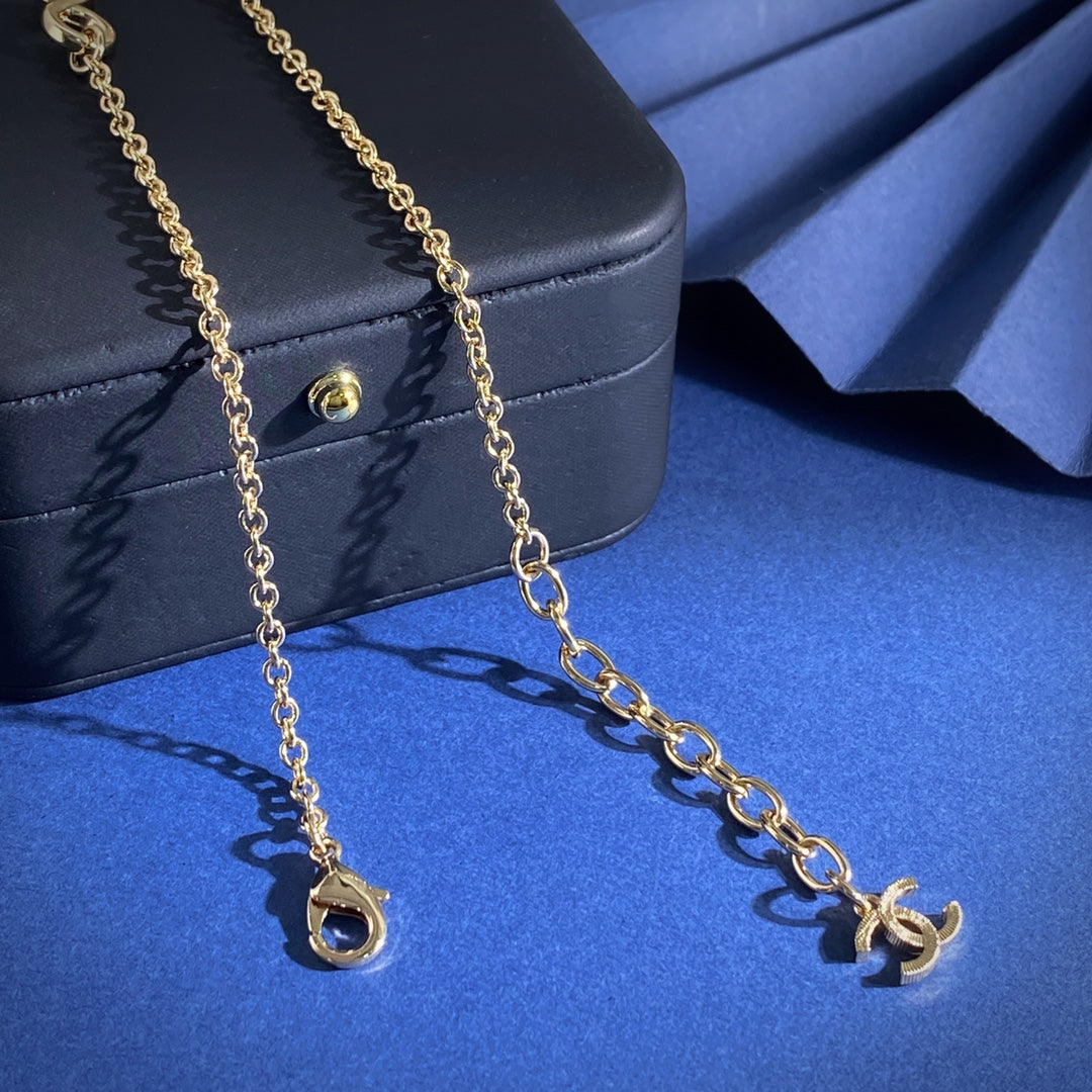 Double-C Emblem Pendant Necklace in Gold-Tone – Heart Detail – Design 002 styled product view