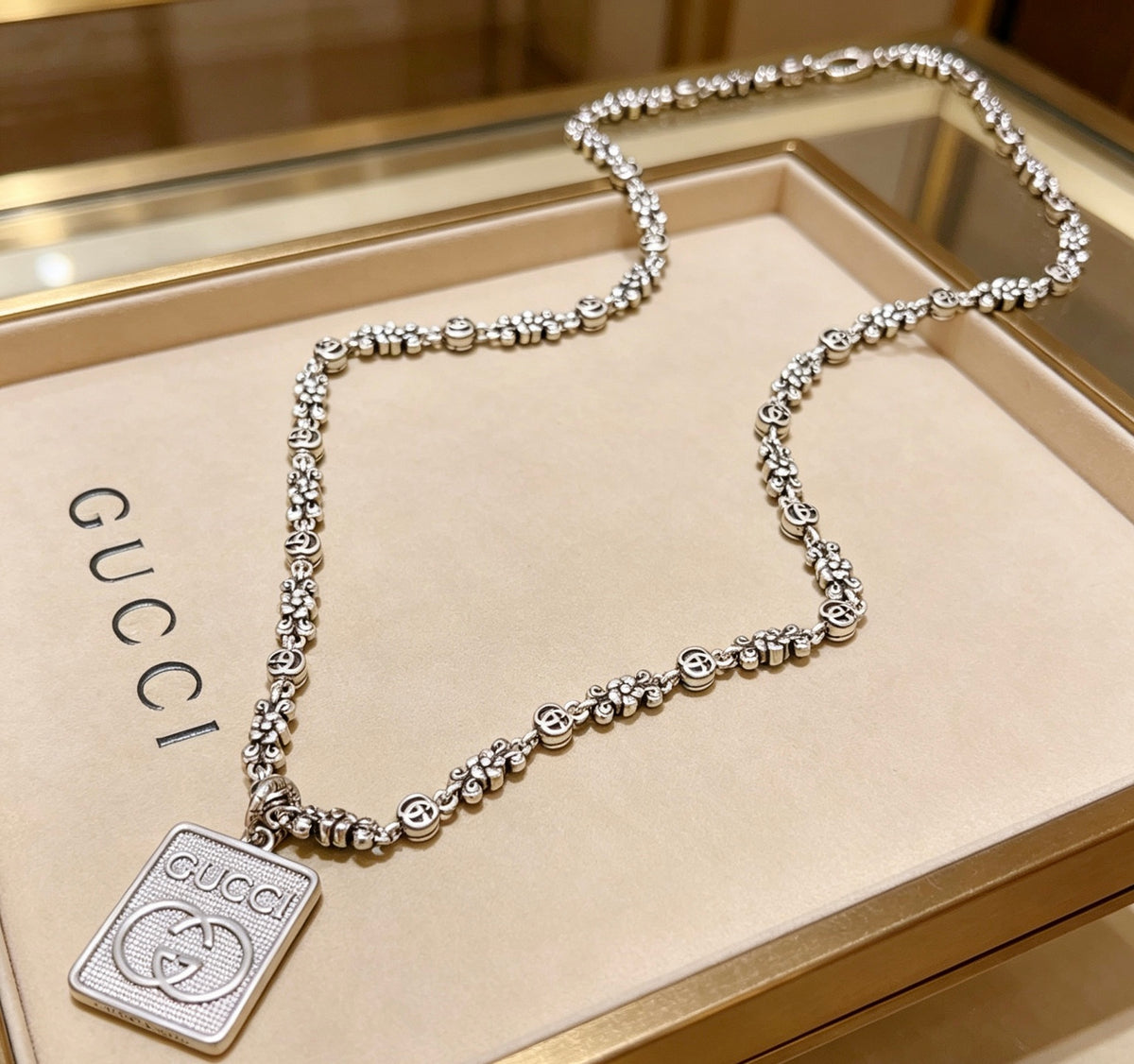 Double-G Emblem Pendant Necklace in Polished Metal-Tone – Vintage Detail – Design 050 main product view