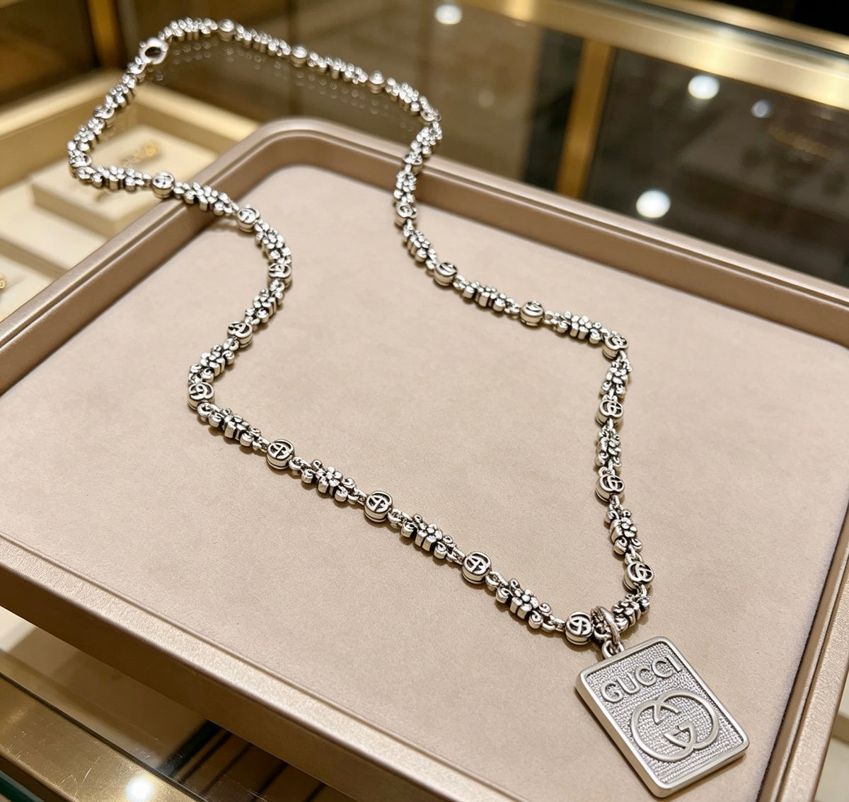 Double-G Emblem Pendant Necklace in Polished Metal-Tone – Vintage Detail – Design 050 front product view