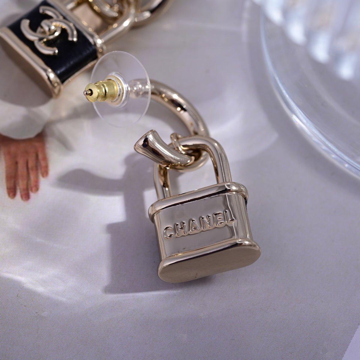 Signature Emblem Stud Earrings in Polished Metal-Tone – Design 086 detail view