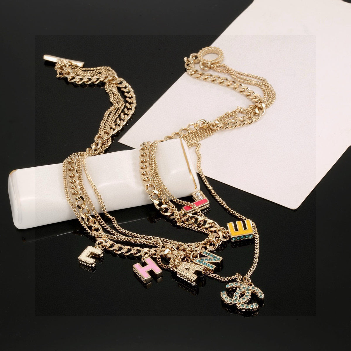 Double-C Emblem Crystal-Accent Pendant Necklace – Design 042 close-up detail
