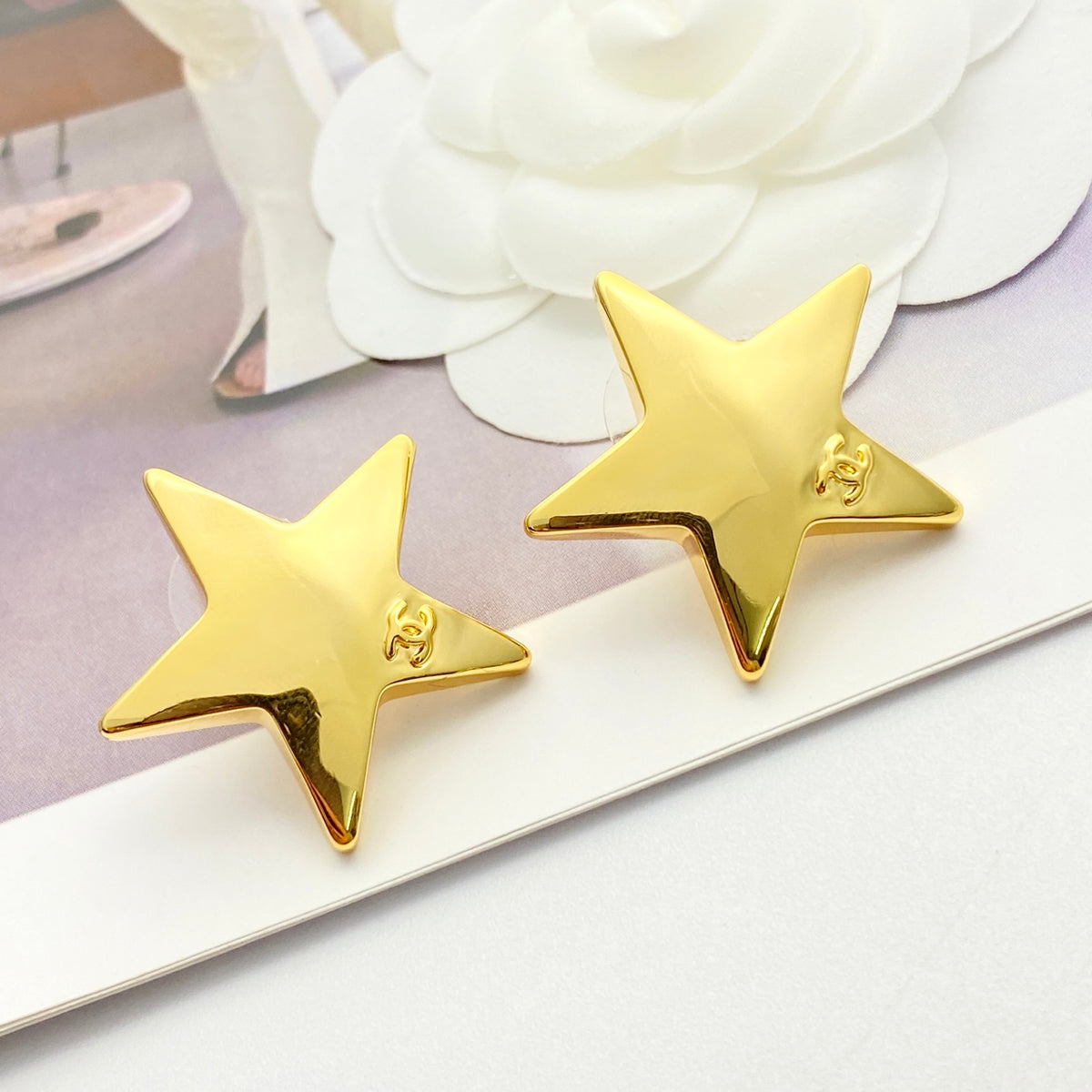 Double-C Emblem Stud Earrings in Gold-Tone – Star Detail – Design 007 main product view