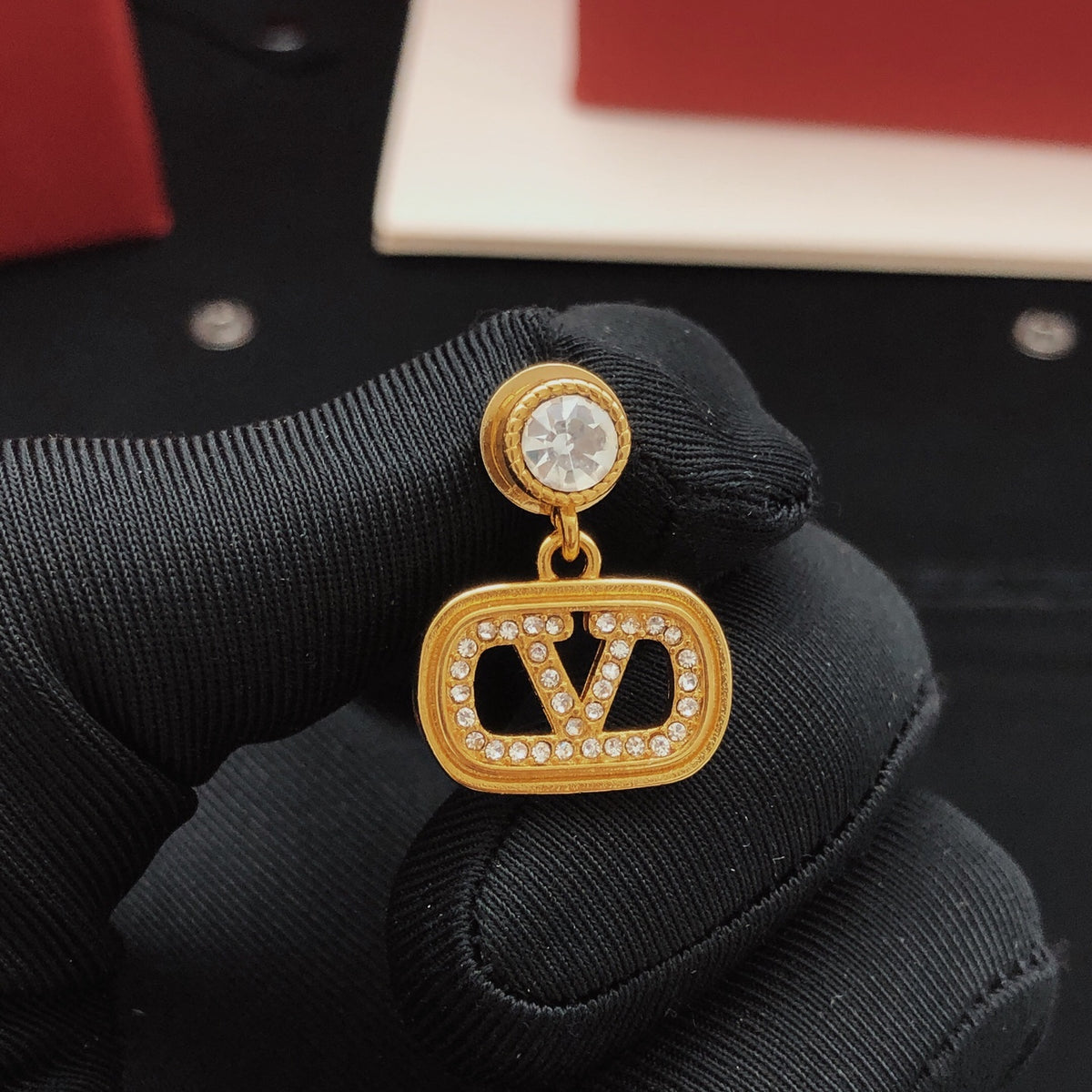 V Emblem Crystal-Accent Stud Earrings – Design 06 close-up view