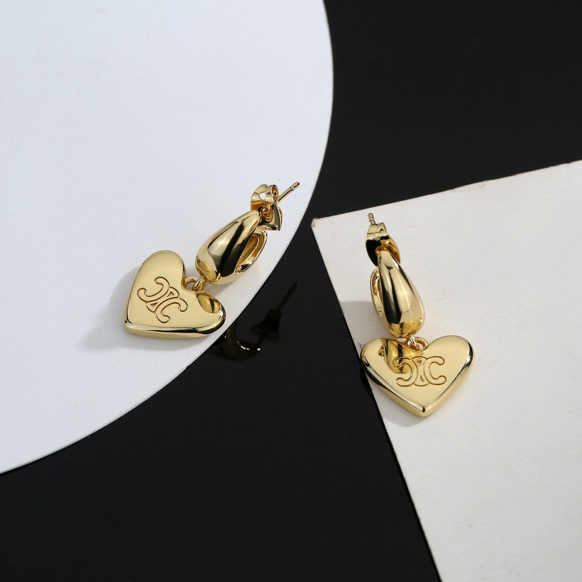 Signature Emblem Stud Earrings in Gold-Tone – Design 08 close-up view
