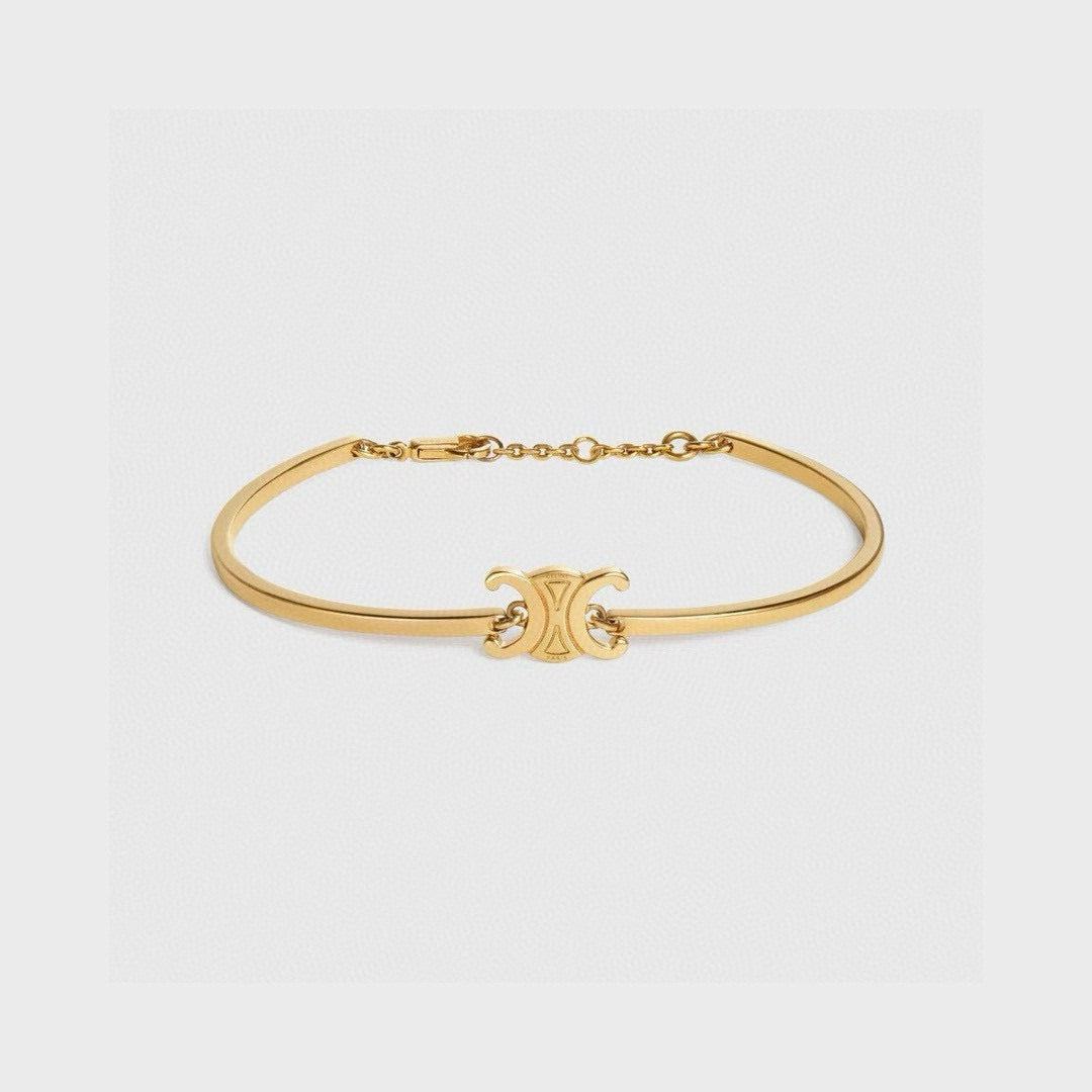 Triomphe-Inspired Emblem Cuff Bracelet in Gold-Tone styled detail