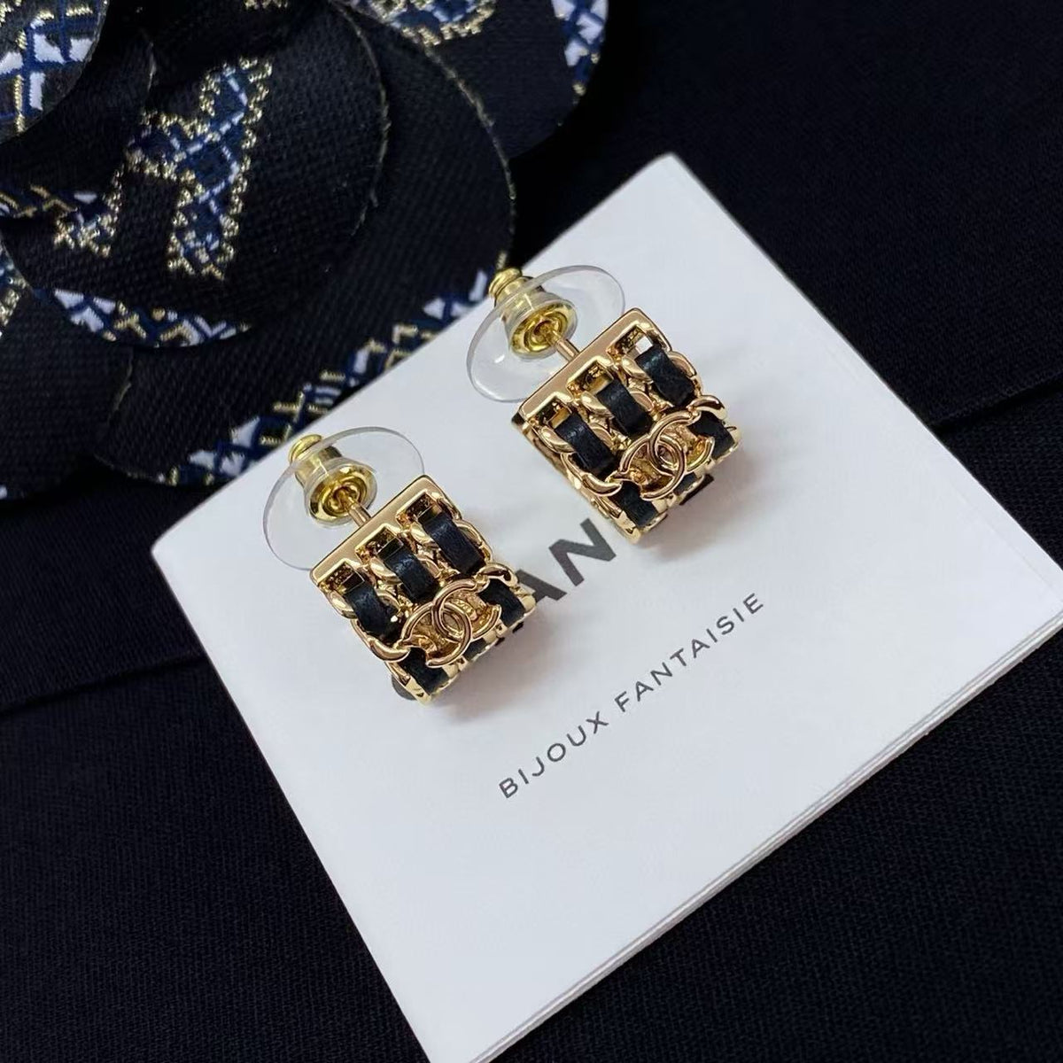 Double-C Emblem Stud Earrings in Polished Metal-Tone – Black Detail – Design 004 detail view