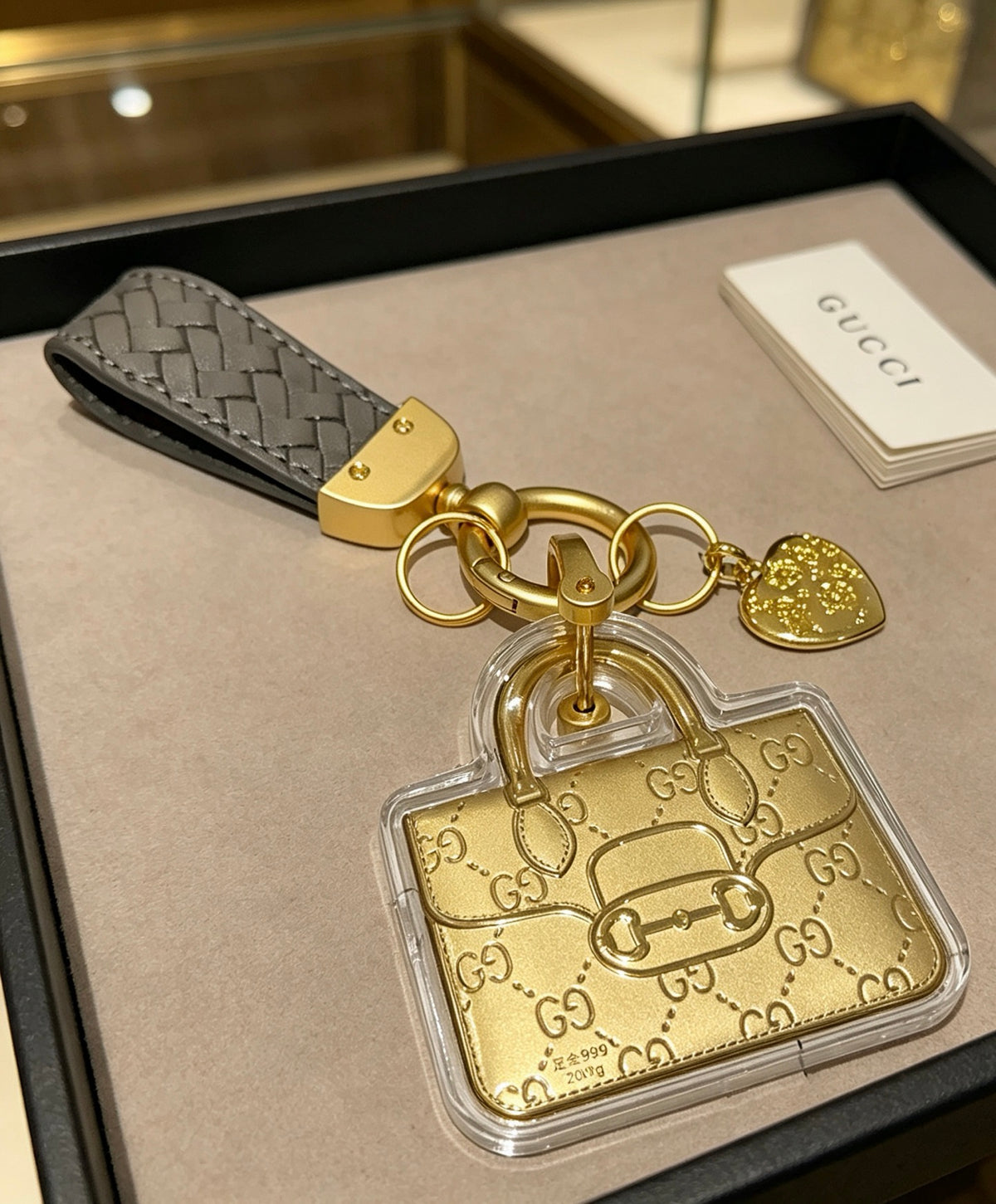 Double-G Emblem Keychain in Polished Metal-Tone – Design 048 detail view