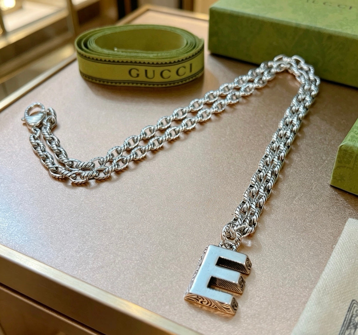 Double-G Emblem Pendant Necklace in Polished Metal-Tone – Vintage Detail – Design 049 close-up detail