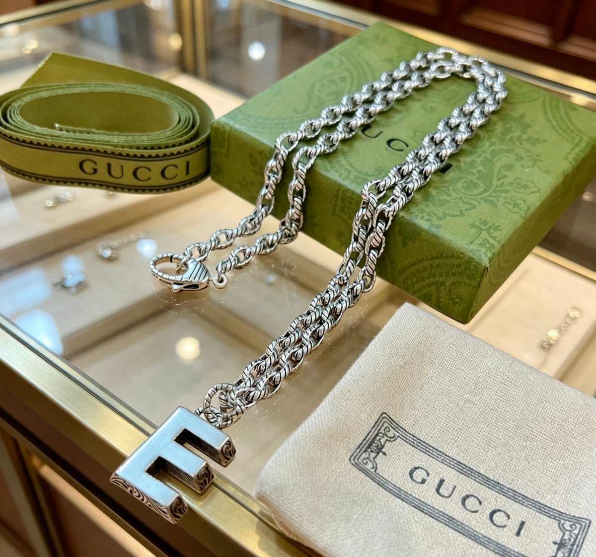 Double-G Emblem Pendant Necklace in Polished Metal-Tone – Vintage Detail – Design 049 detail view