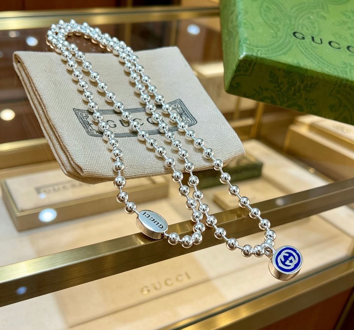 Double-G Emblem Pendant Necklace in Silver-Tone – Design 052 close-up detail
