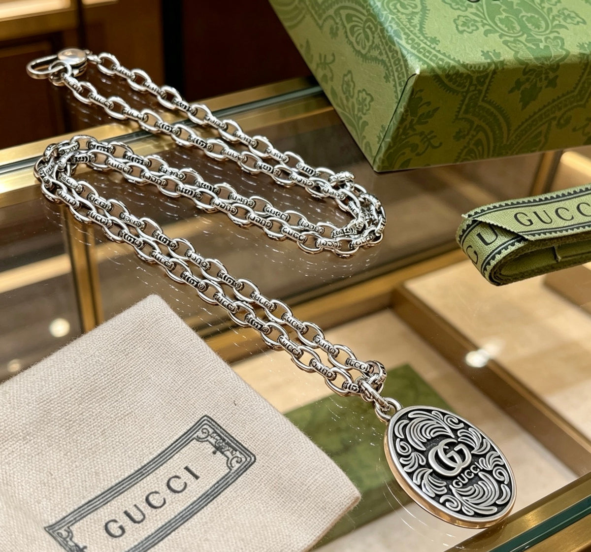 Double-G Emblem Pendant Necklace in Polished Metal-Tone – Design 182 close-up detail