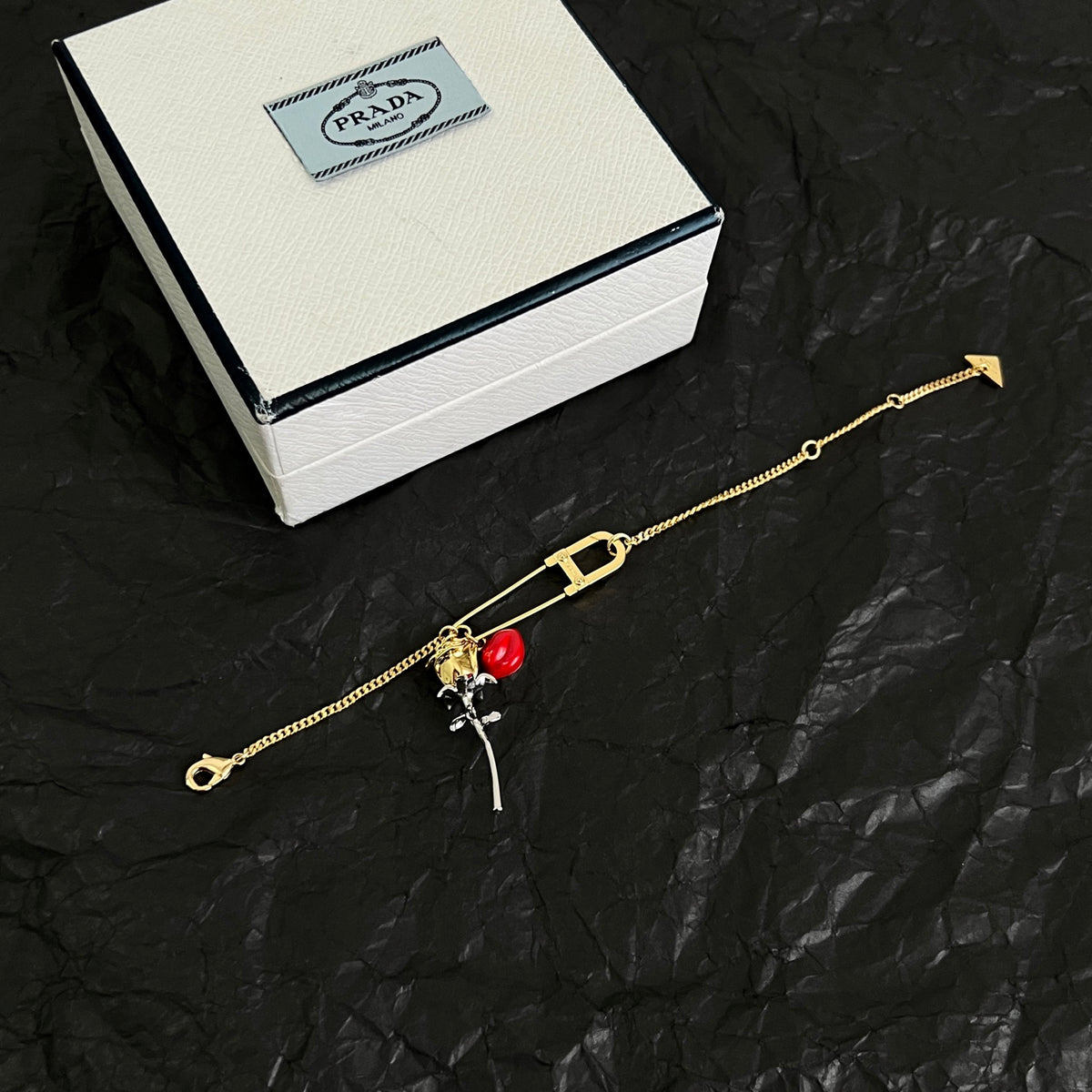 Signature Emblem Bracelet in Polished Metal-Tone side detail