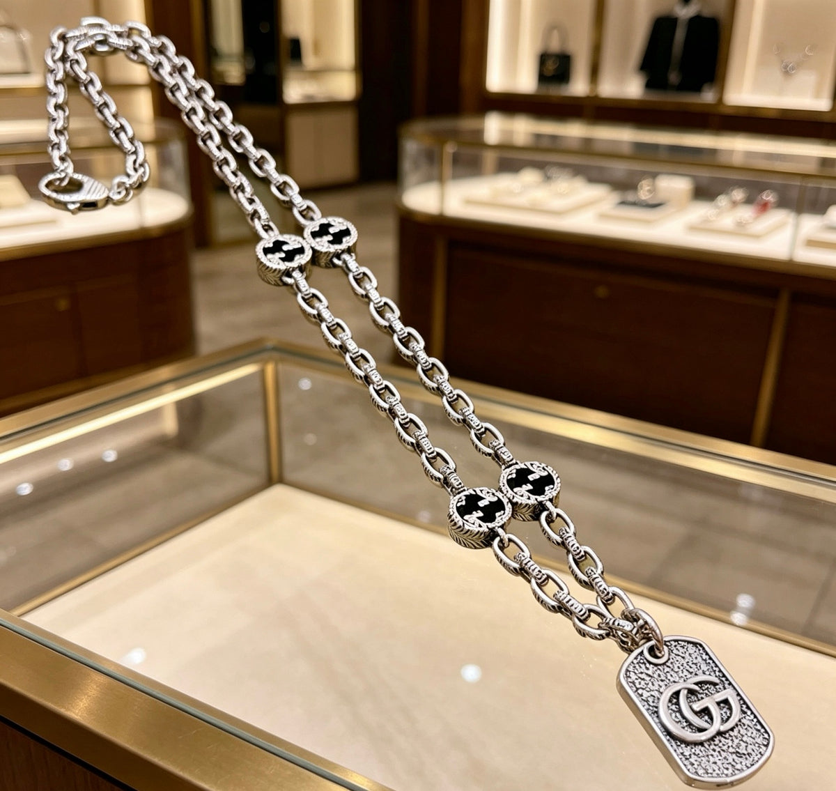 Double-G Emblem Pendant Necklace in Silver-Tone – Vintage Detail – Design 048 styled product view