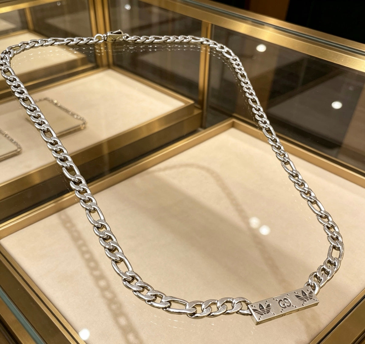 Double-G Emblem Pendant Necklace in Polished Metal-Tone – Design 181 side detail