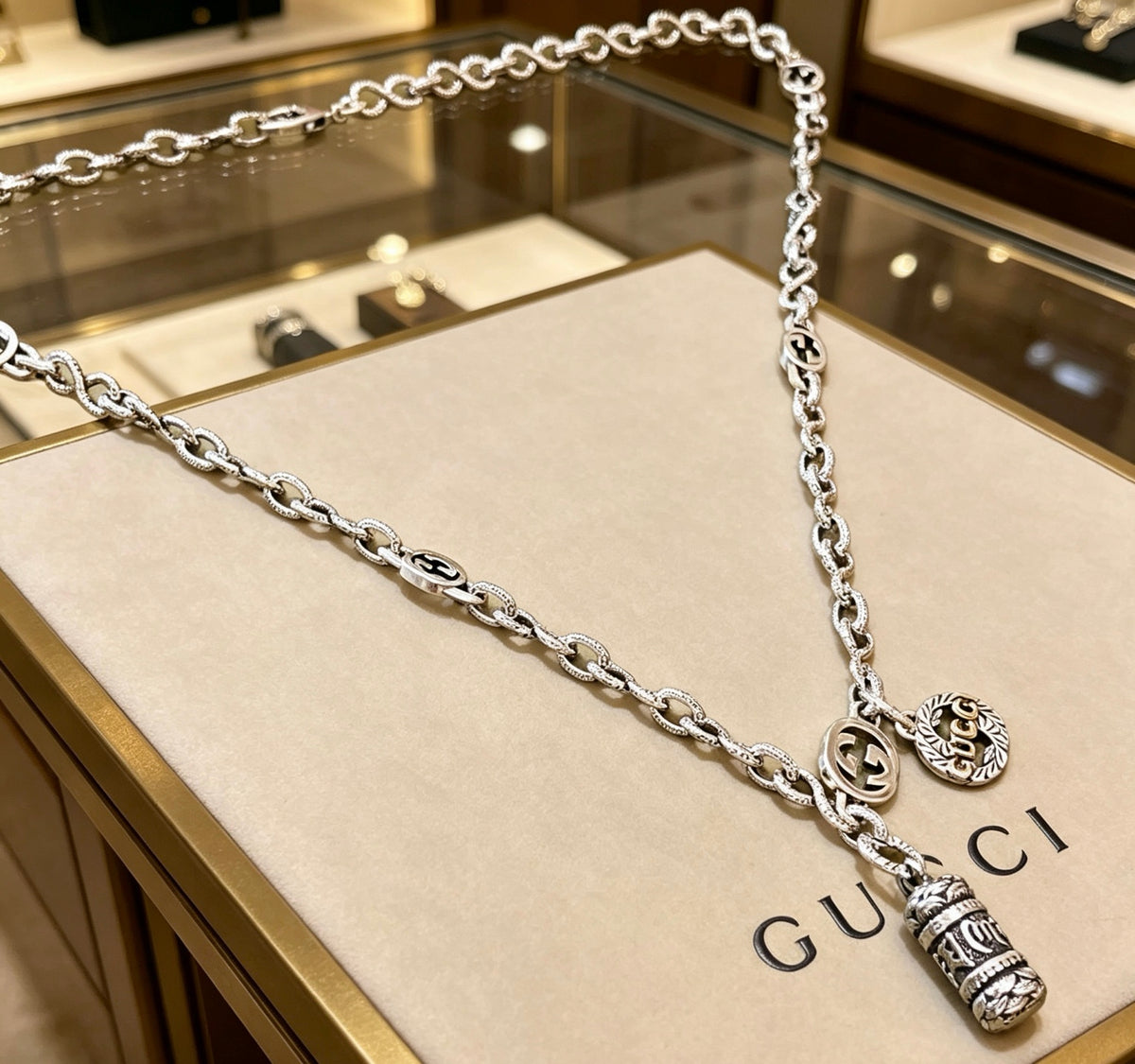 Double-G Emblem Pendant Necklace in Polished Metal-Tone – Vintage Detail – Design 048 main product view