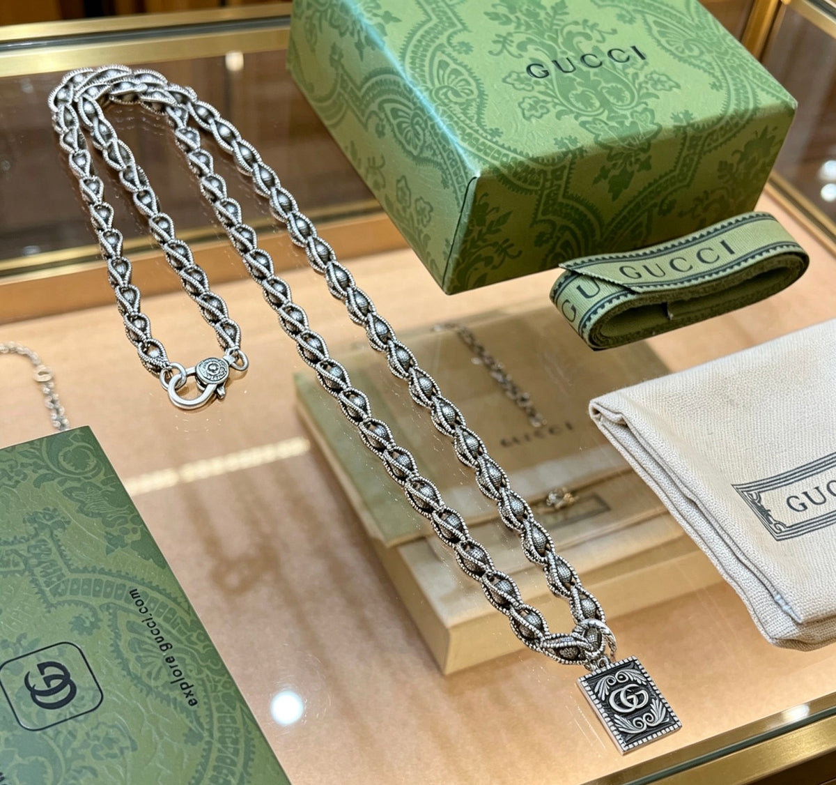Double-G Emblem Pendant Necklace in Polished Metal-Tone – Design 024 close-up detail