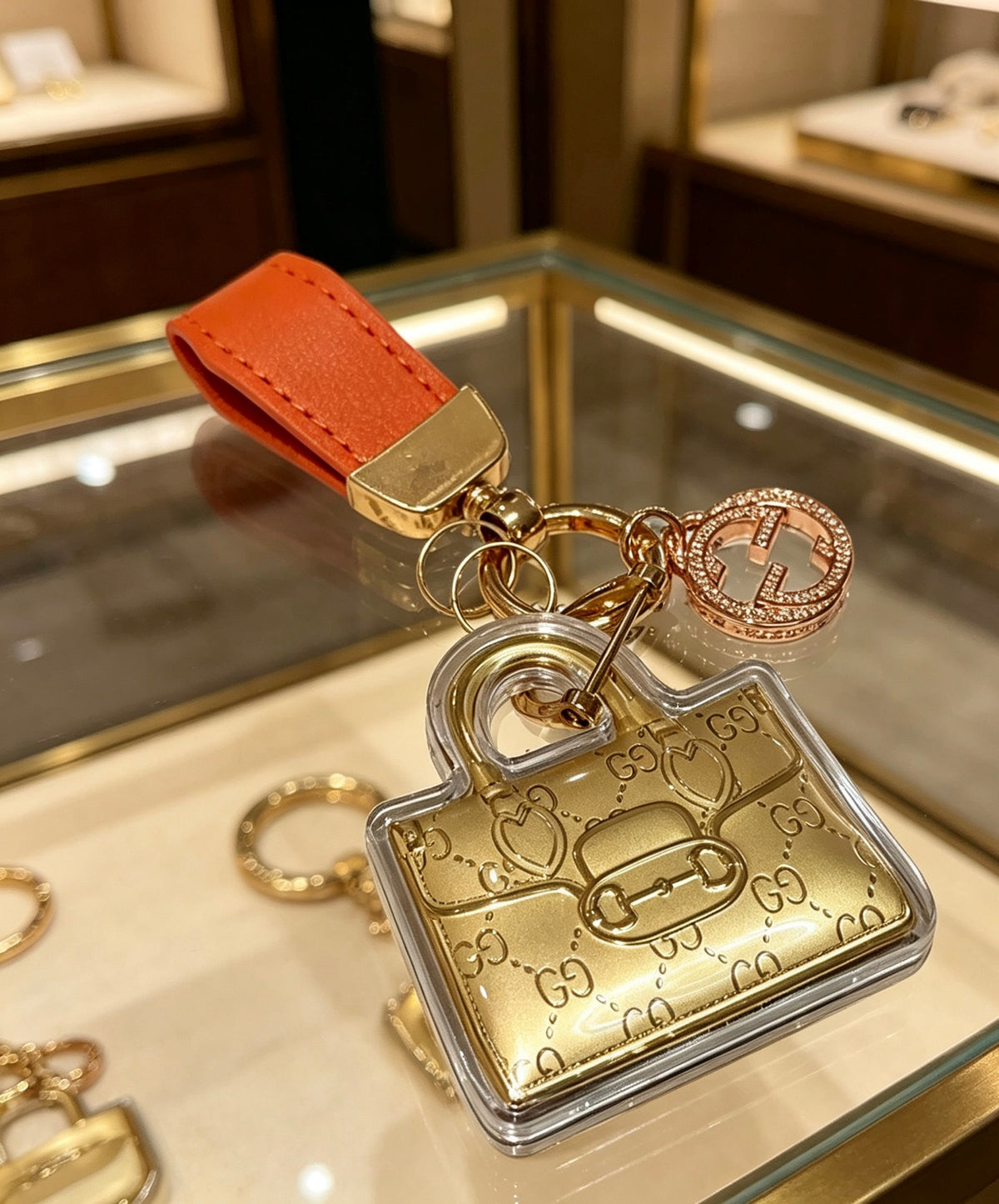 Double-G Emblem Keychain in Polished Metal-Tone – Design 005 close-up detail