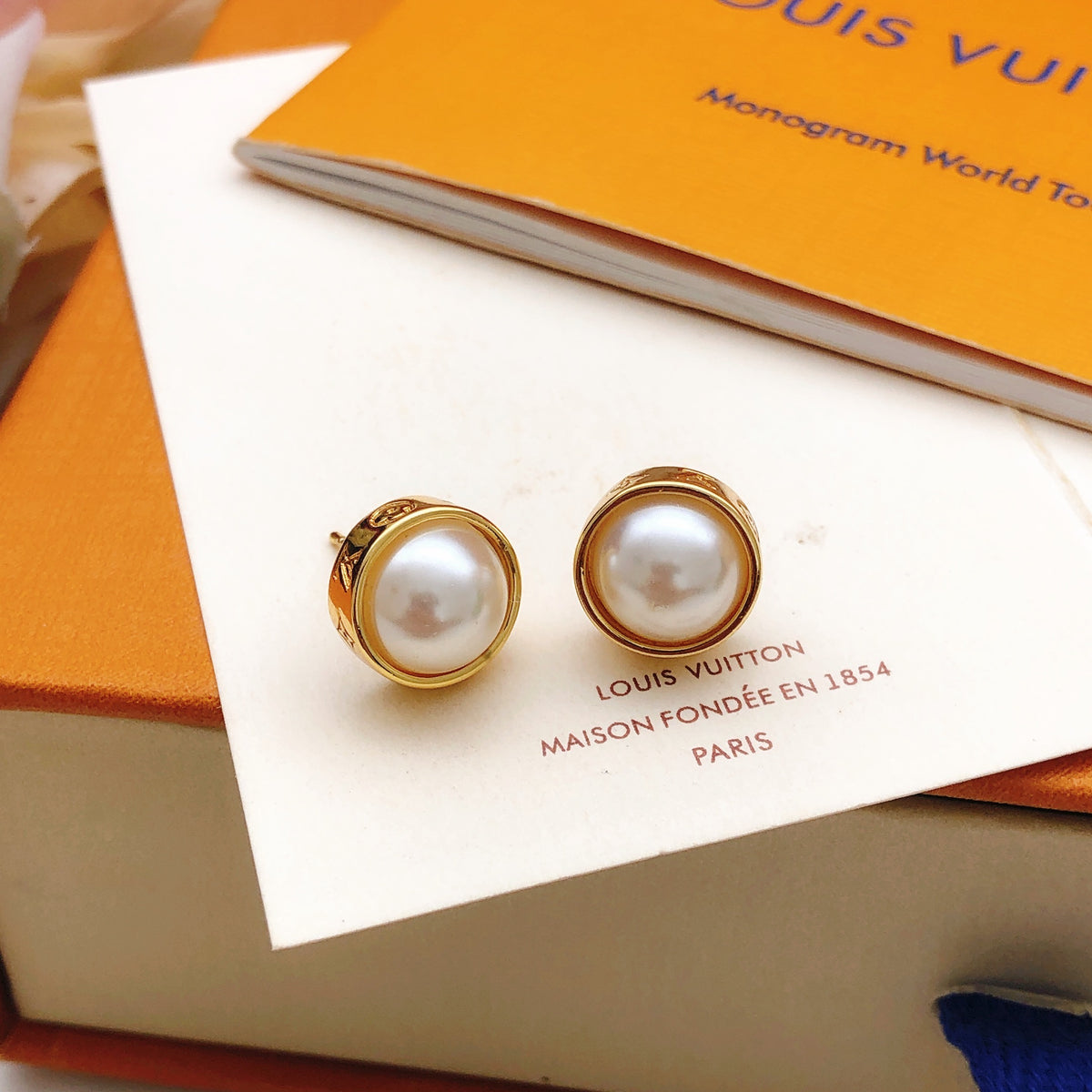 Round Stud Earrings in Gold-Tone – Pearl Detail front product view