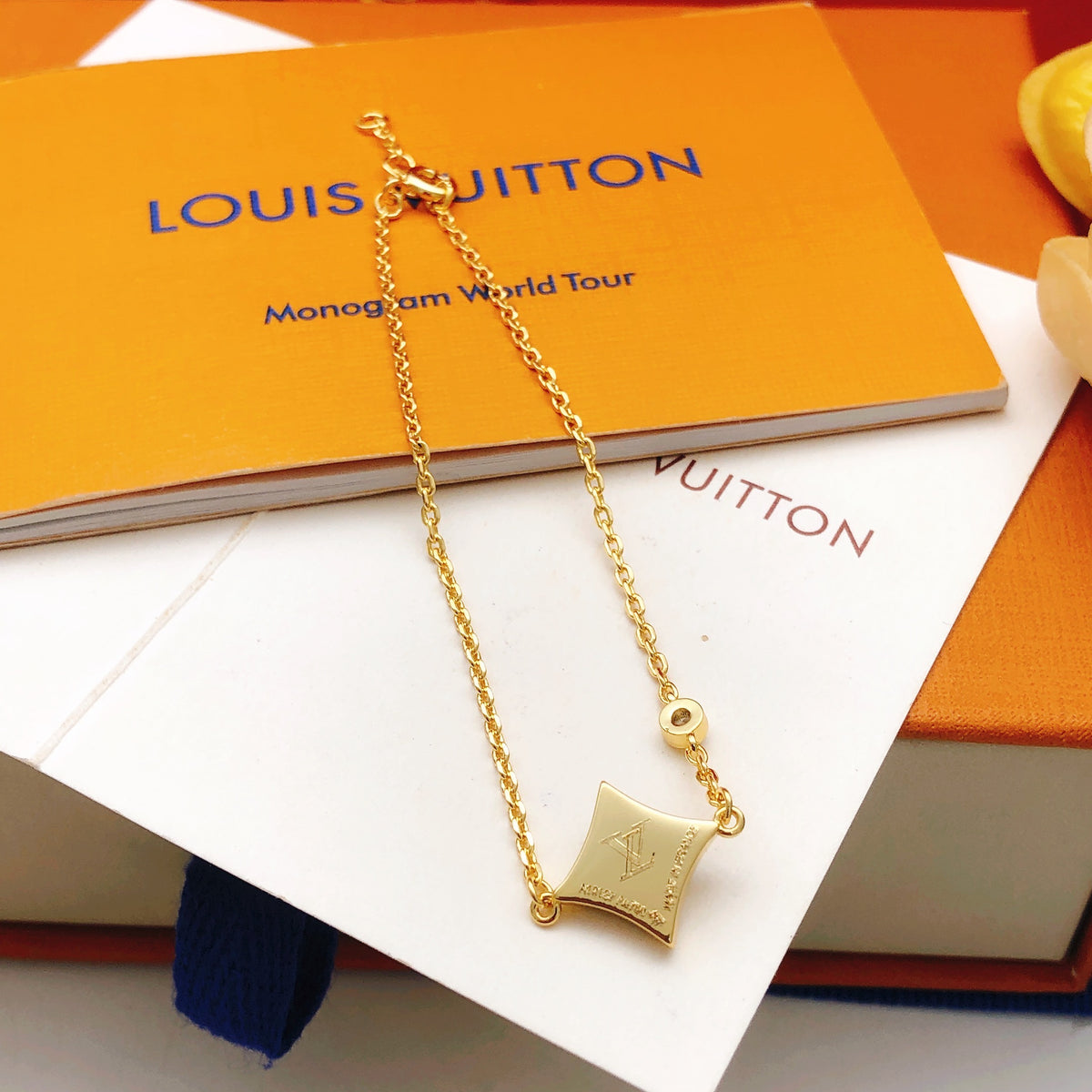 Geometric Emblem Bracelet in Gold-Tone – Blue Detail detail view