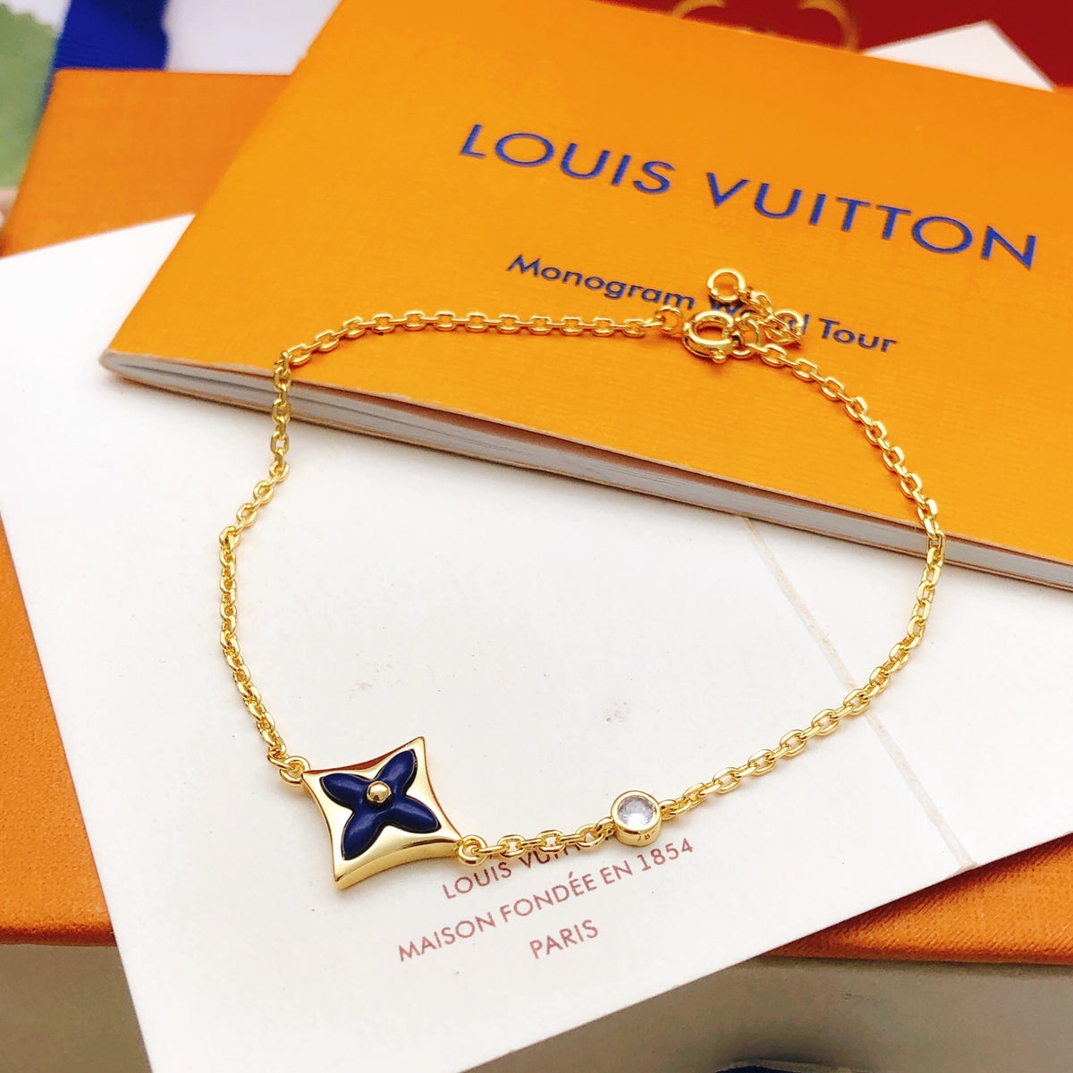 Geometric Emblem Bracelet in Gold-Tone – Blue Detail main product view
