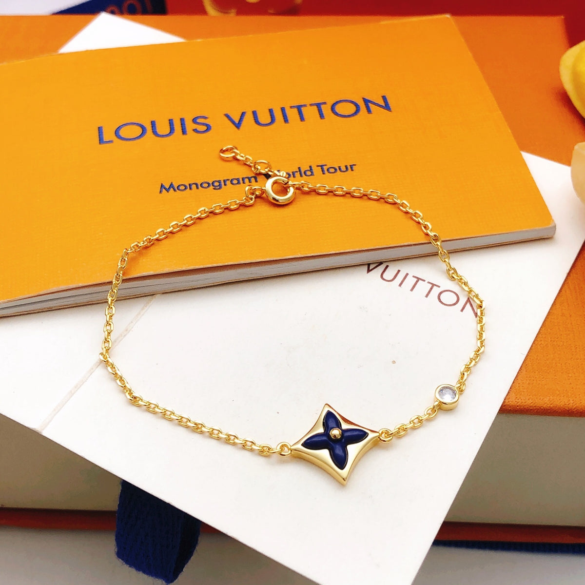 Geometric Emblem Bracelet in Gold-Tone – Blue Detail front product view