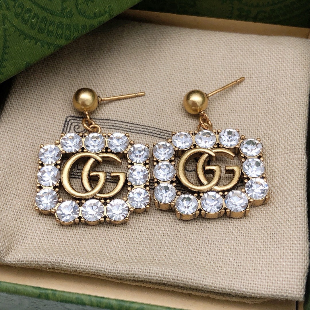 Geometric Emblem Stud Earrings in Polished Metal-Tone – Design 013 close-up detail
