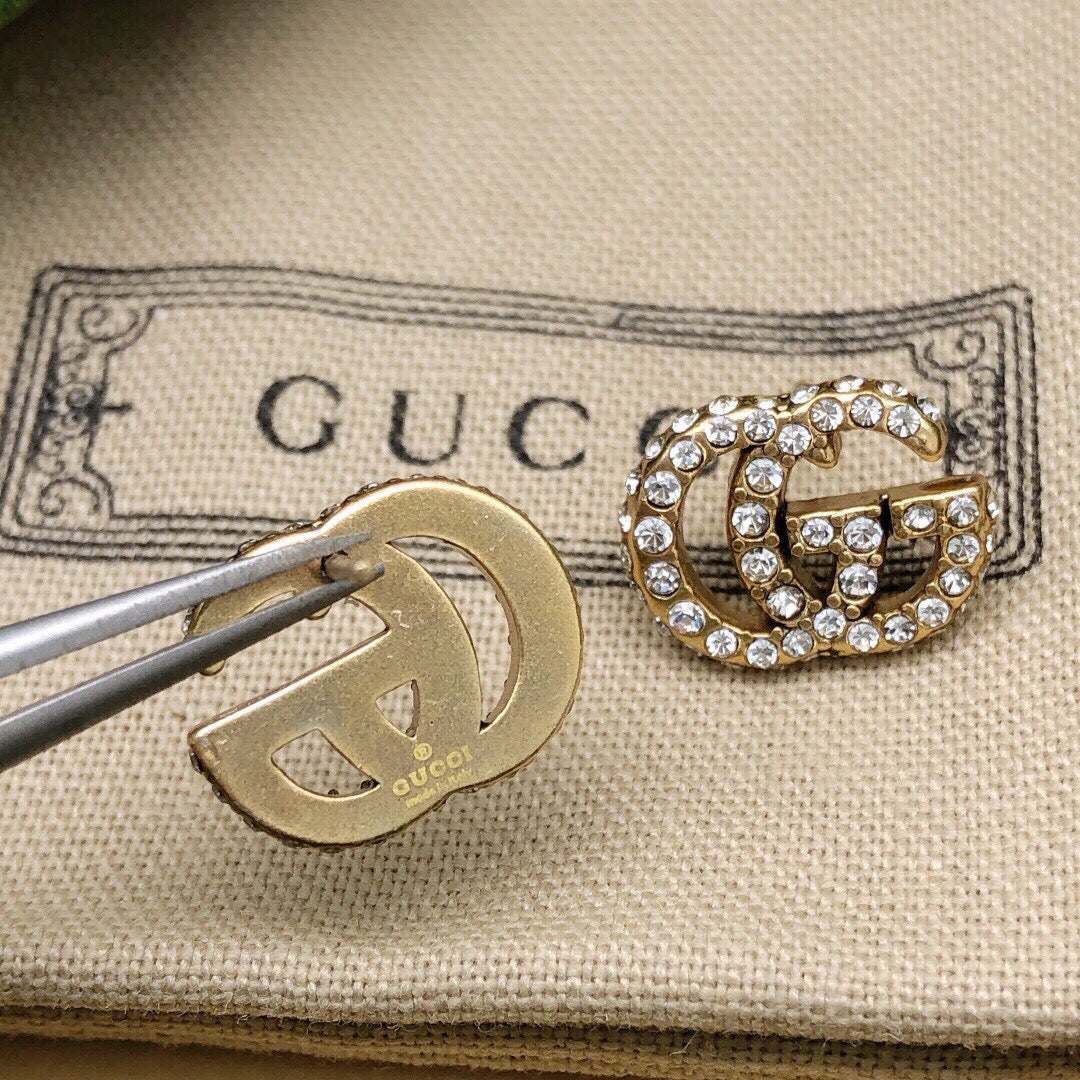 Double-G Emblem Stud Earrings in Polished Metal-Tone – Design 004 main product view