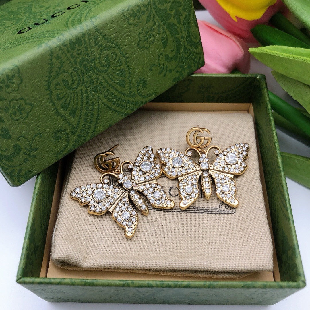 Geometric Emblem Stud Earrings in Polished Metal-Tone – Design 010 detail view