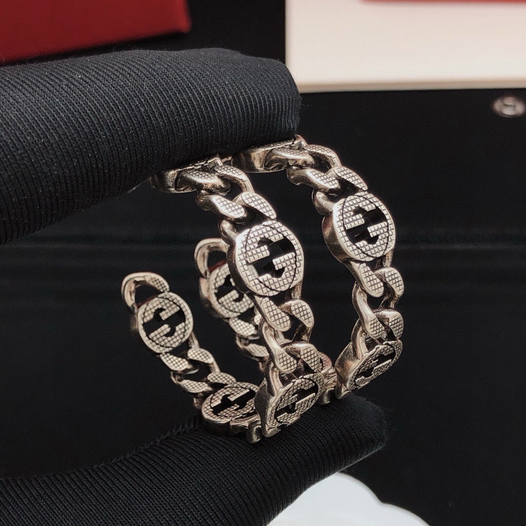 Geometric Emblem Jewelry Accessory in Silver-Tone – Vintage Detail close-up detail